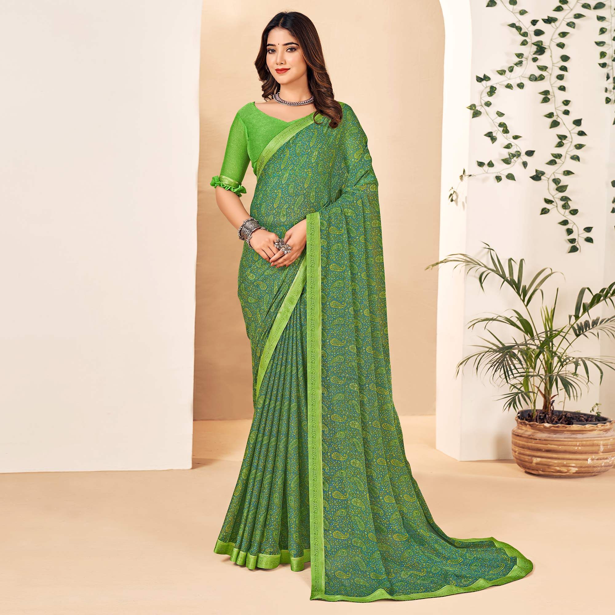 Green Floral Printed Chiffon Saree With Lace Border