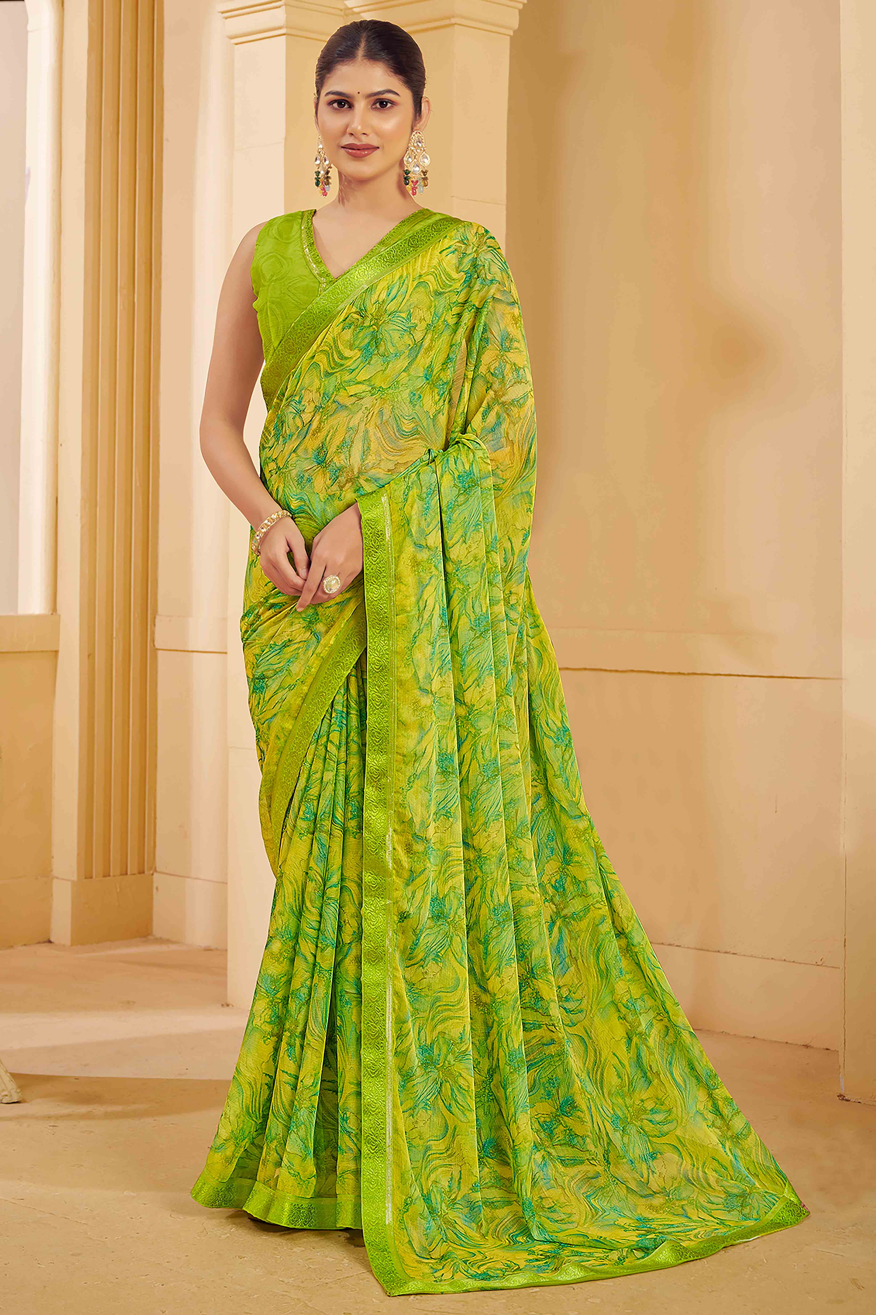 Green Chiffon Saree Adorned With Artistic Floral Print & Finely Crafted Woven Lace Border