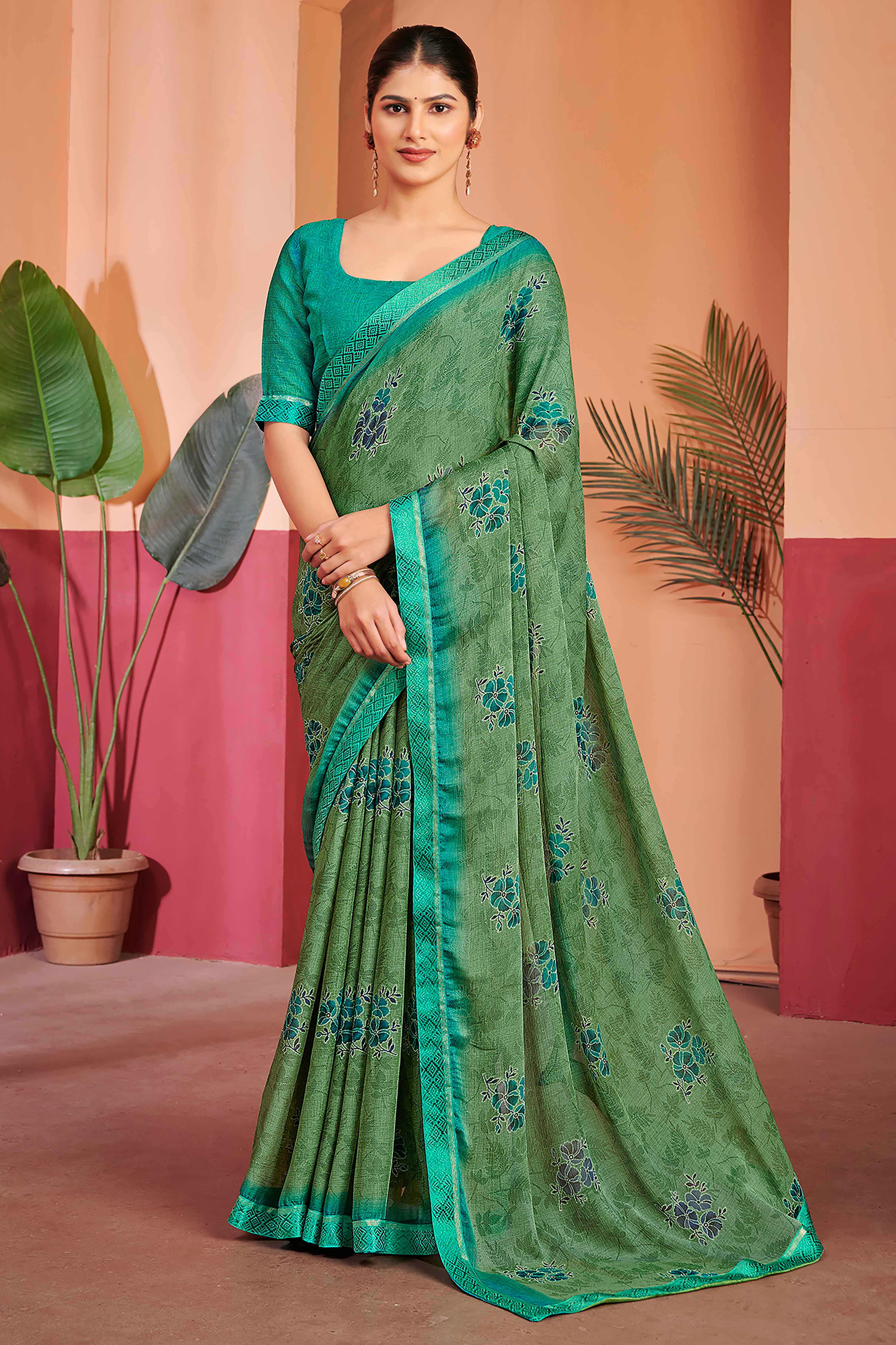 Green Chiffon Saree Featuring Delicate Floral Prints & A Graceful Lace Border