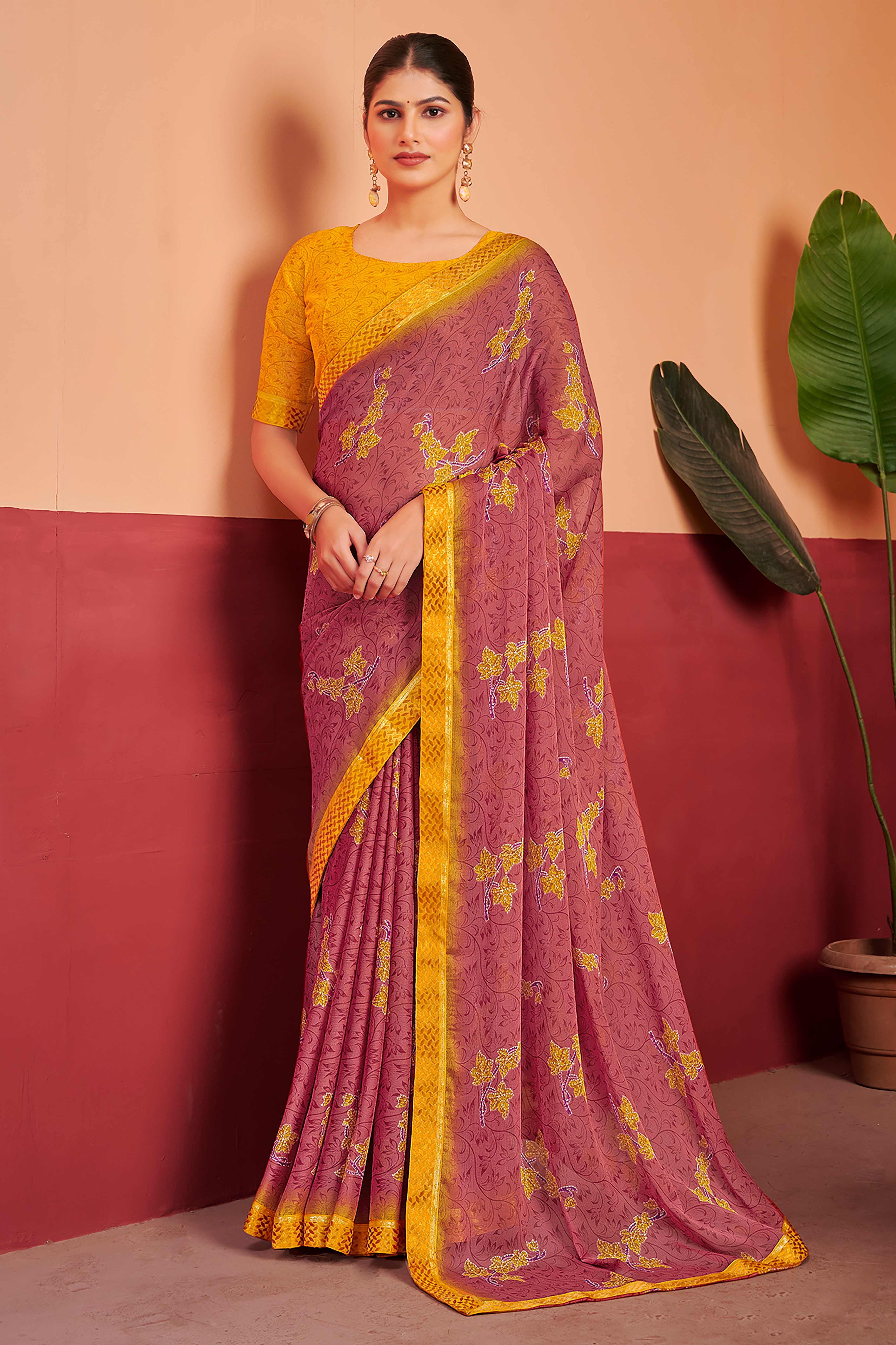 Brick Red Chiffon Saree Featuring Delicate Floral Prints & A Graceful Lace Border