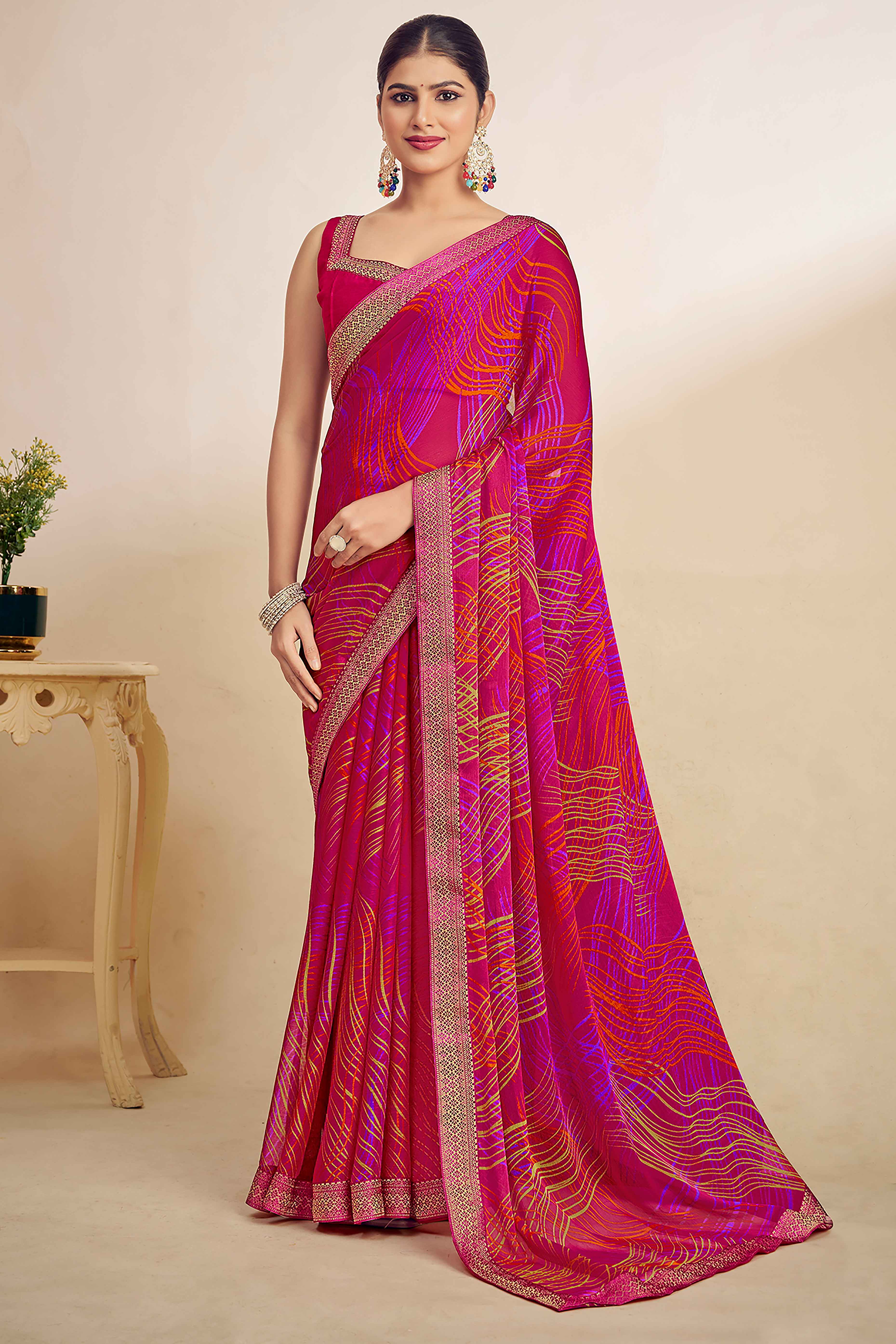 Magenta Chiffon Saree Adorned With Artistic Print & Finely Crafted Woven Lace Border