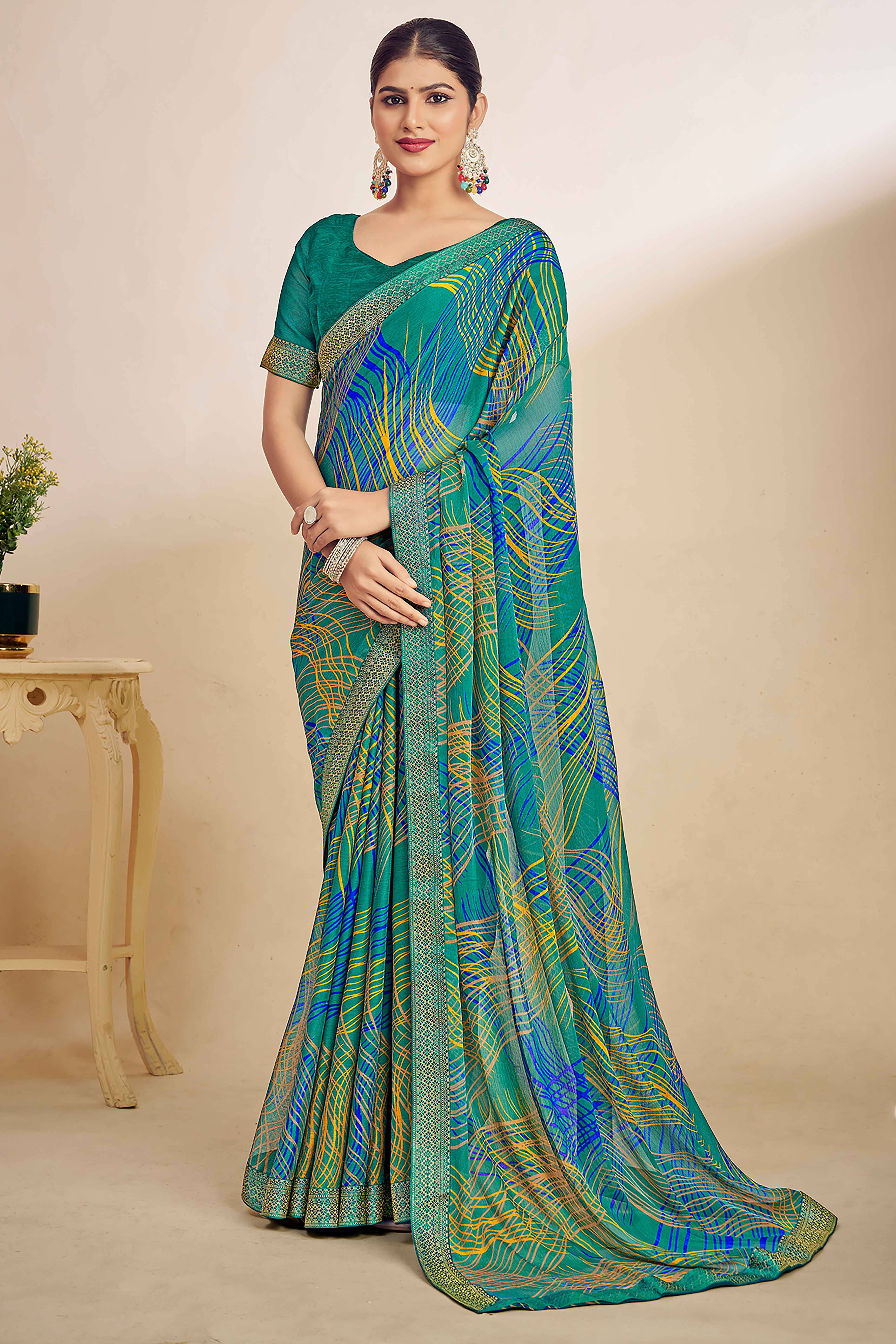 Teal Chiffon Saree Adorned With Artistic Print & Finely Crafted Woven Lace Border