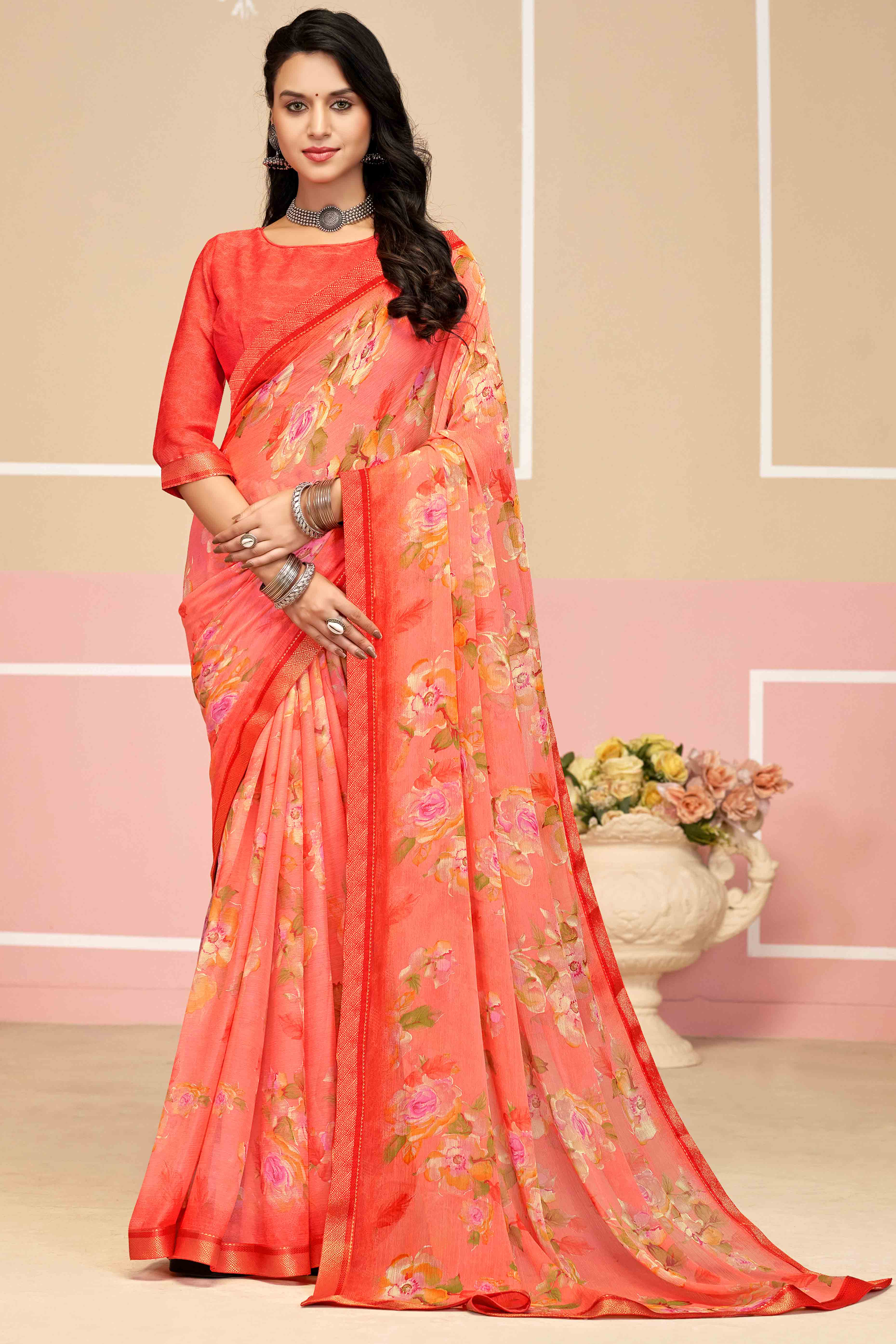Elegant Floral Printed Chiffon Saree In Salmon Pink with Delicate Woven Lace Border