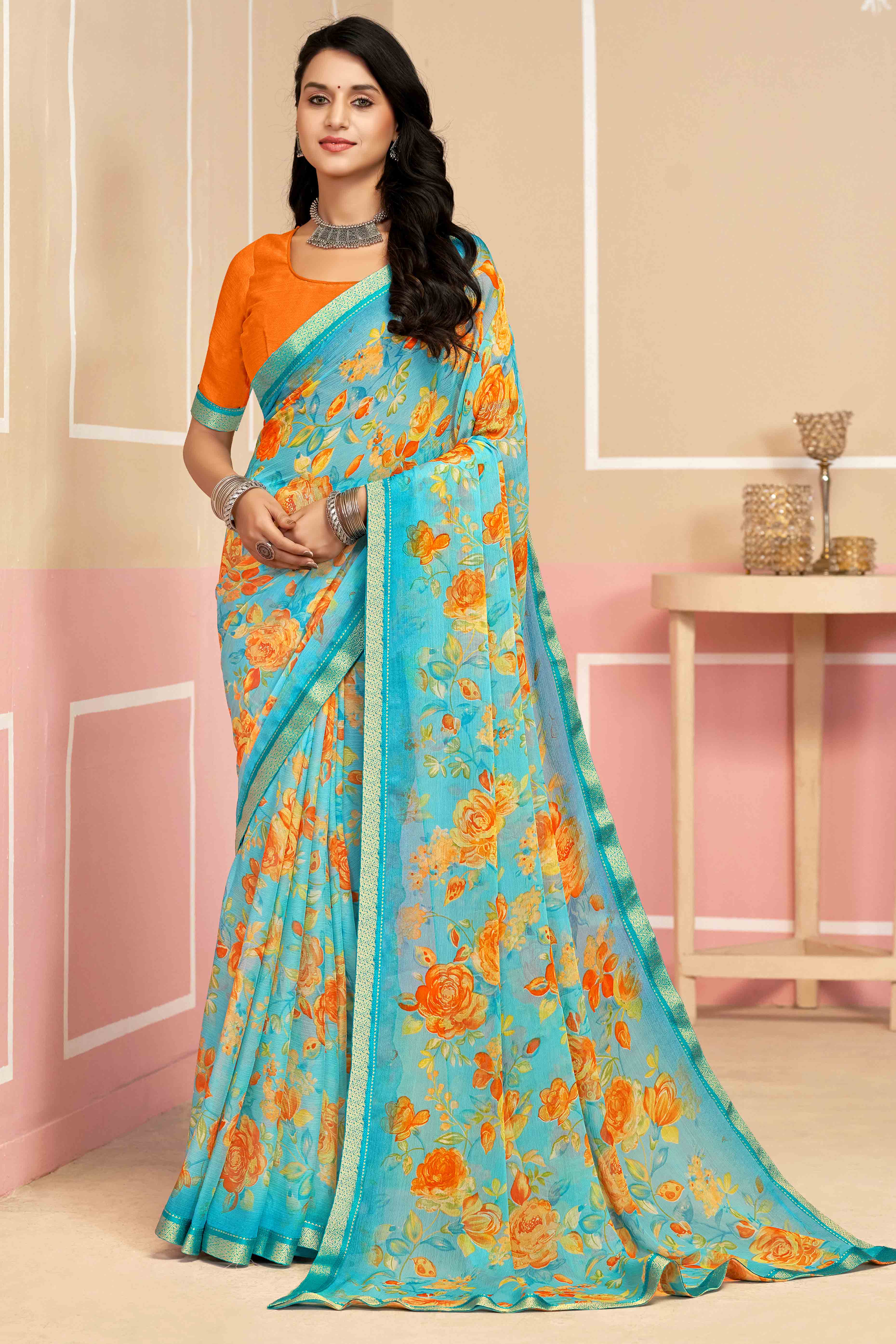 Sophisticated Floral Printed Chiffon Saree In Sky Blue with Delicate Woven Lace Border