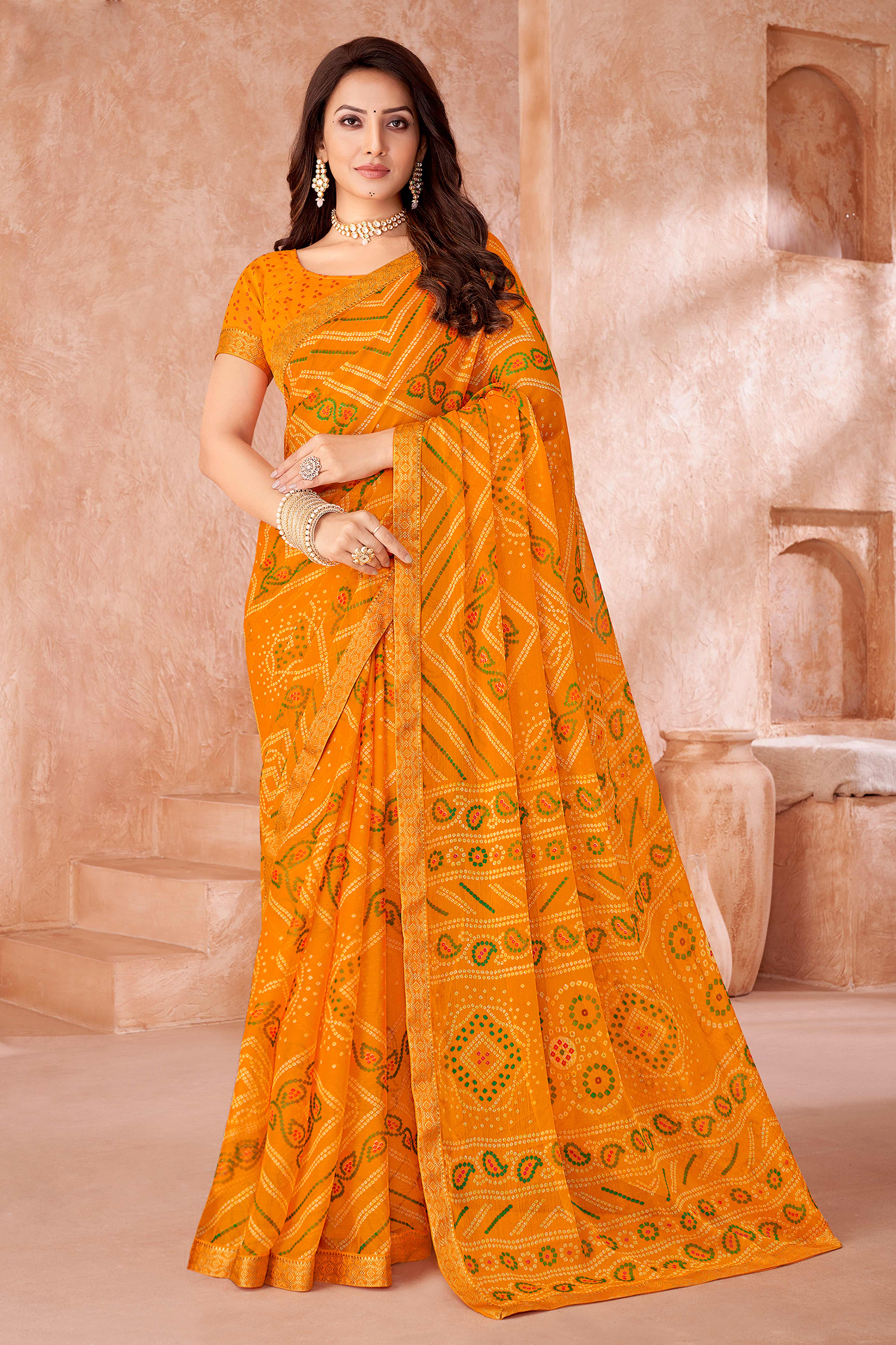 Mustard Chiffon Saree Featuring Traditional Bandhani Prints & A Graceful Lace Edge