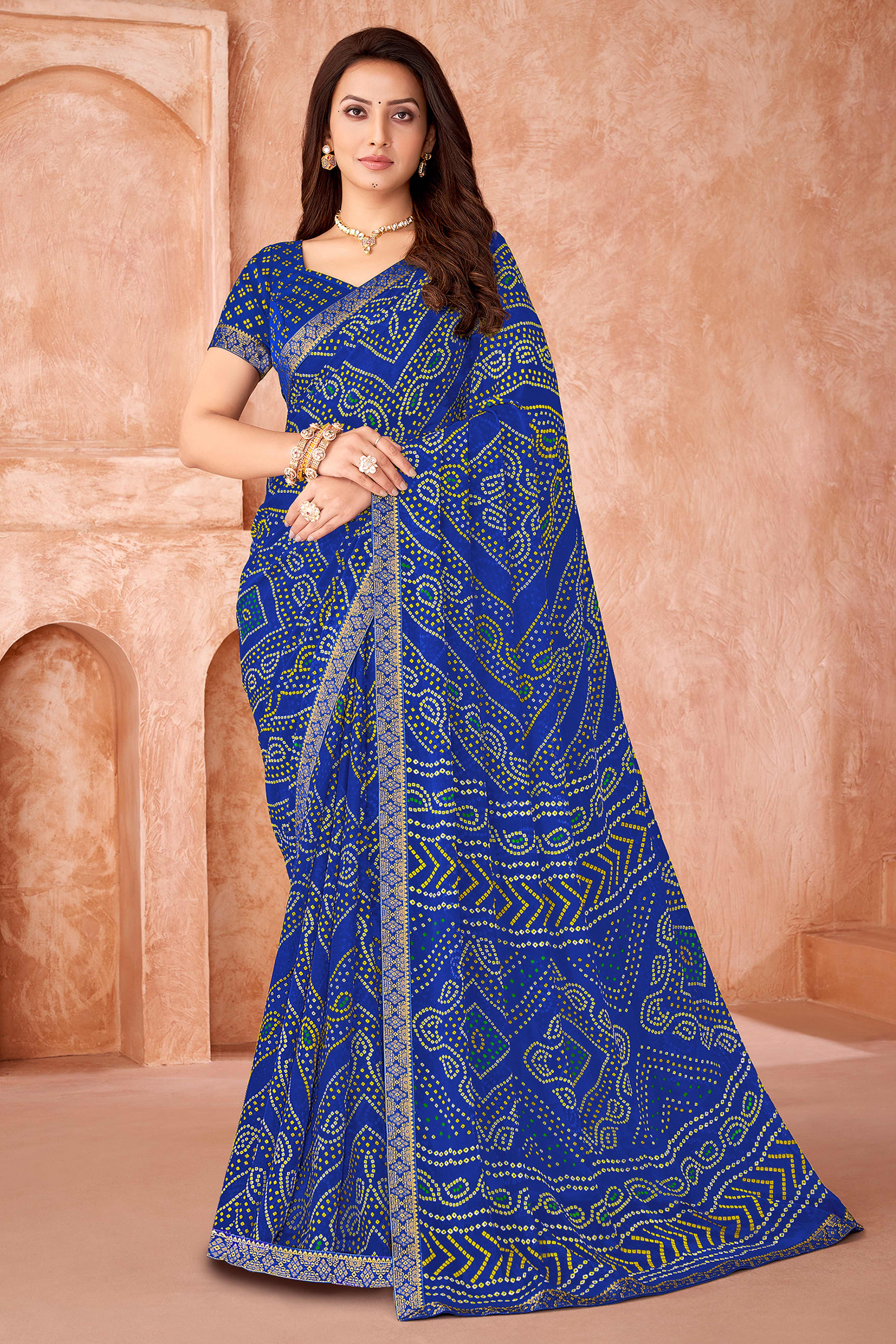 Blue Chiffon Saree Featuring Traditional Bandhani Prints & A Graceful Lace Edge