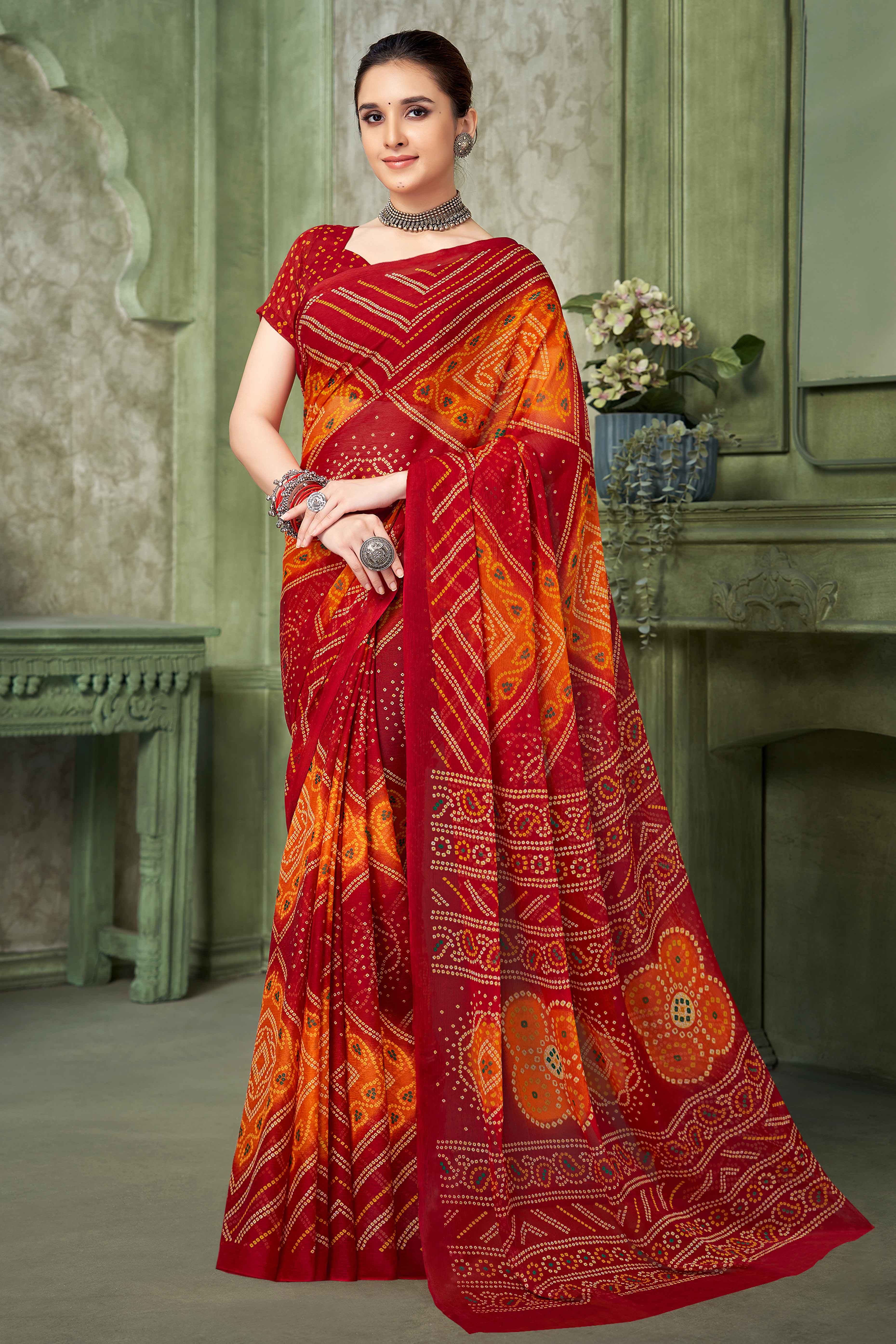 Red Chiffon Saree Adorned With Traditional Bandhani Print