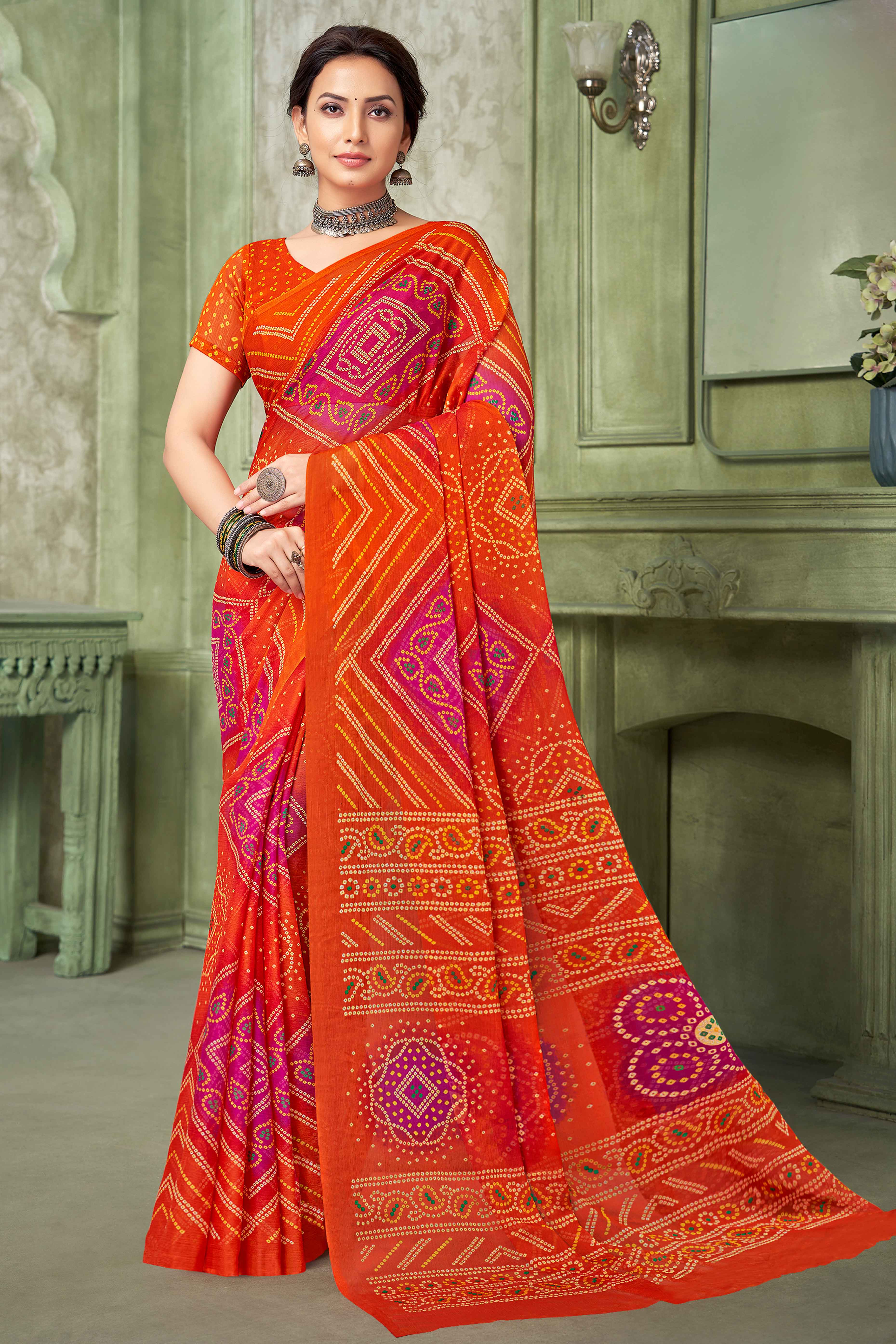 Orange Chiffon Saree Adorned With Traditional Bandhani Print
