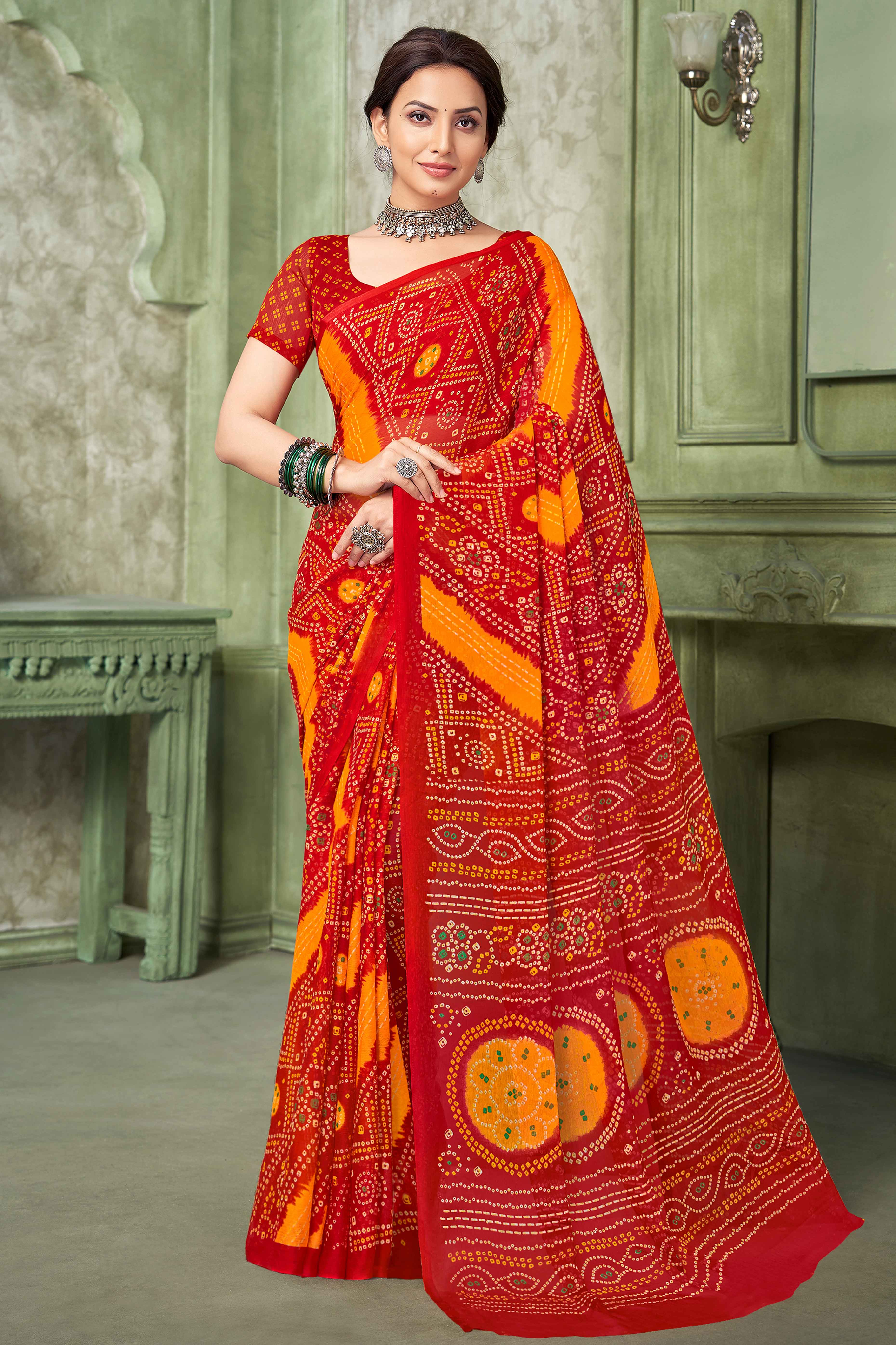 Red Chiffon Saree Adorned With Traditional Bandhani Print