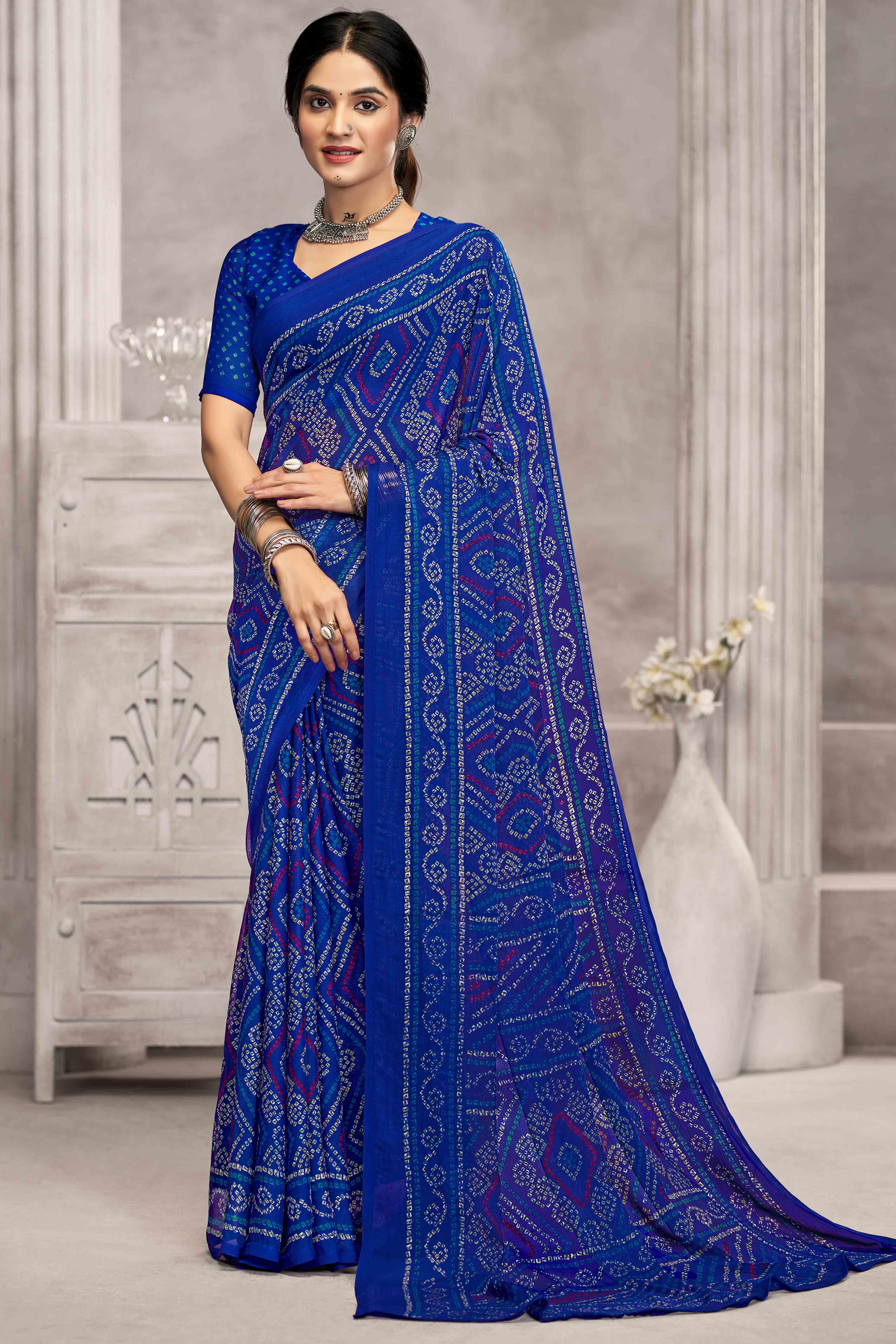 Blue Chiffon Saree Features Bandhani Print for Casual Occasion