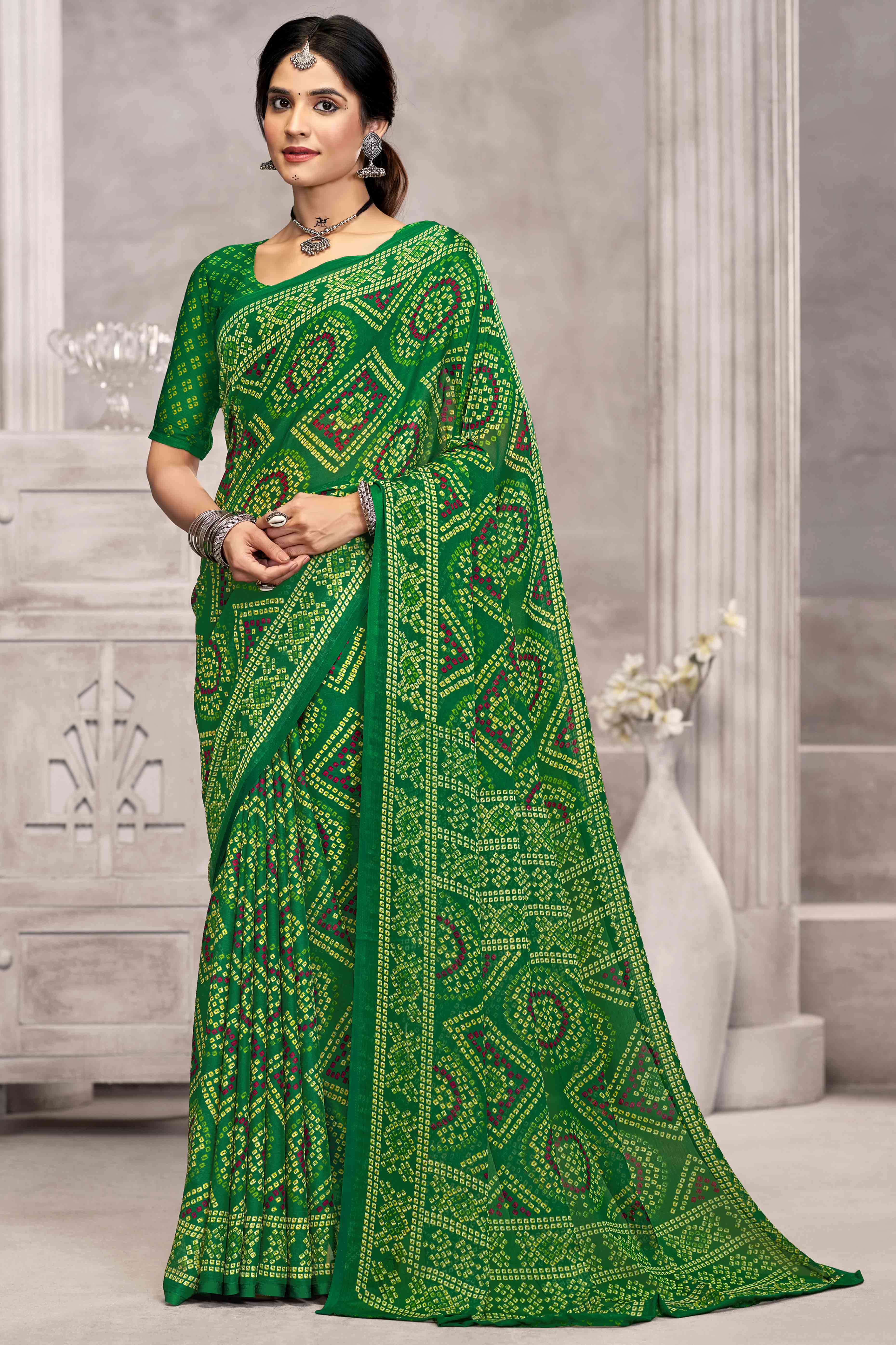 Green Chiffon Saree Features Bandhani Print for Casual Occasion