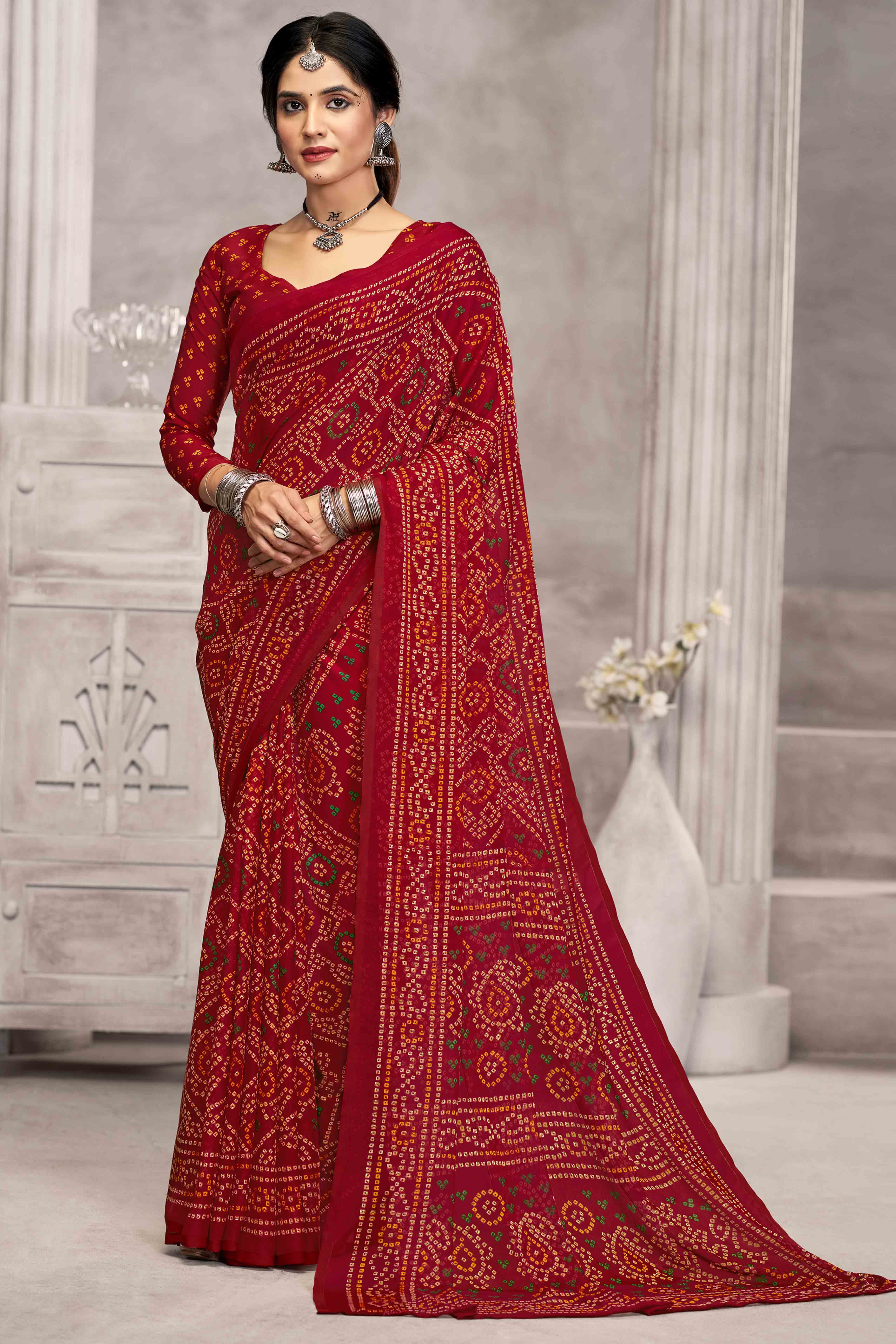 Red Chiffon Saree Features Bandhani Print for Casual Occasion