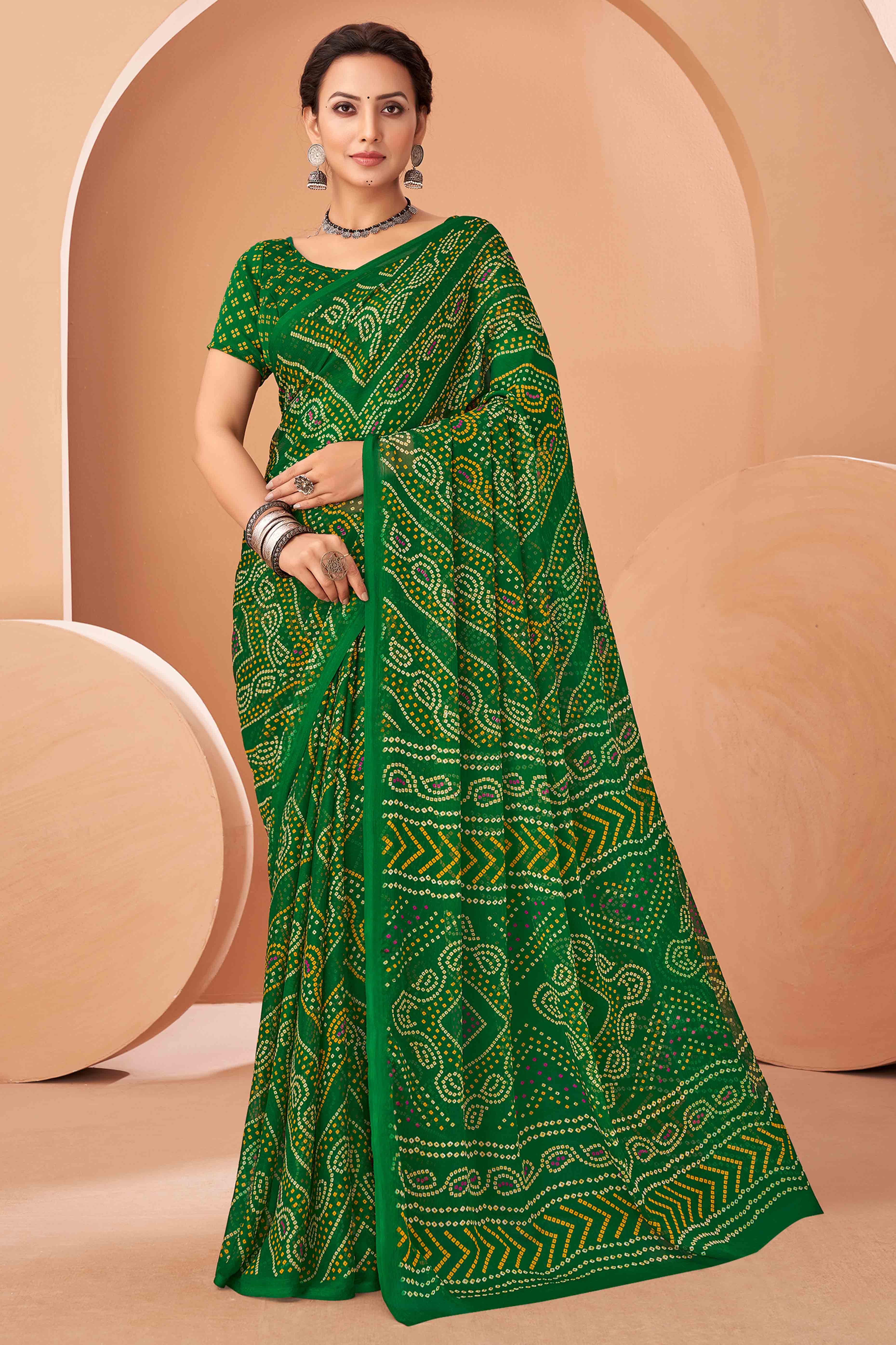 Green Bandhani Printed Chiffon Saree Accented With Intricate Lace Border Work