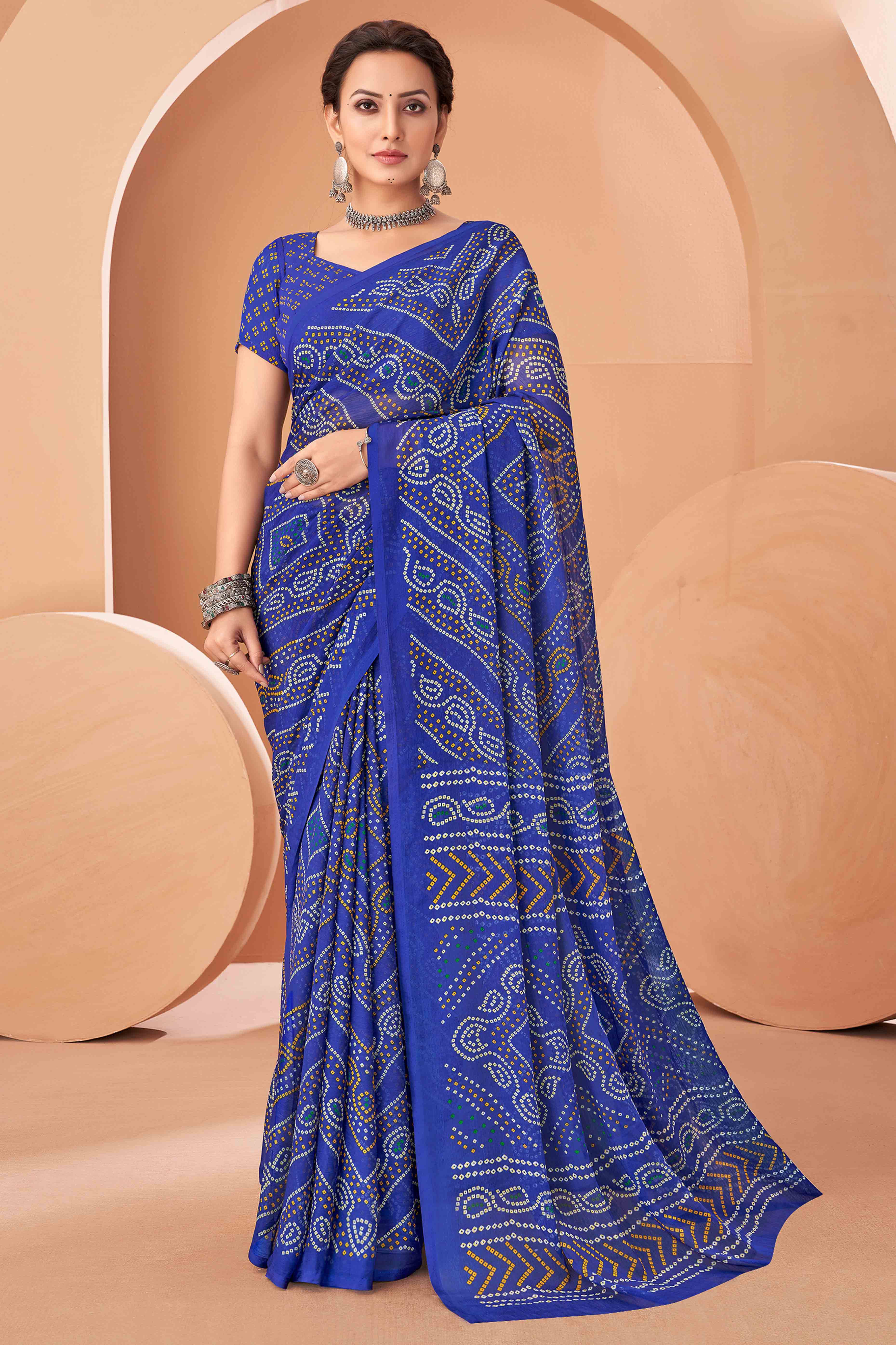 Blue Bandhani Printed Chiffon Saree Accented With Intricate Lace Border Work