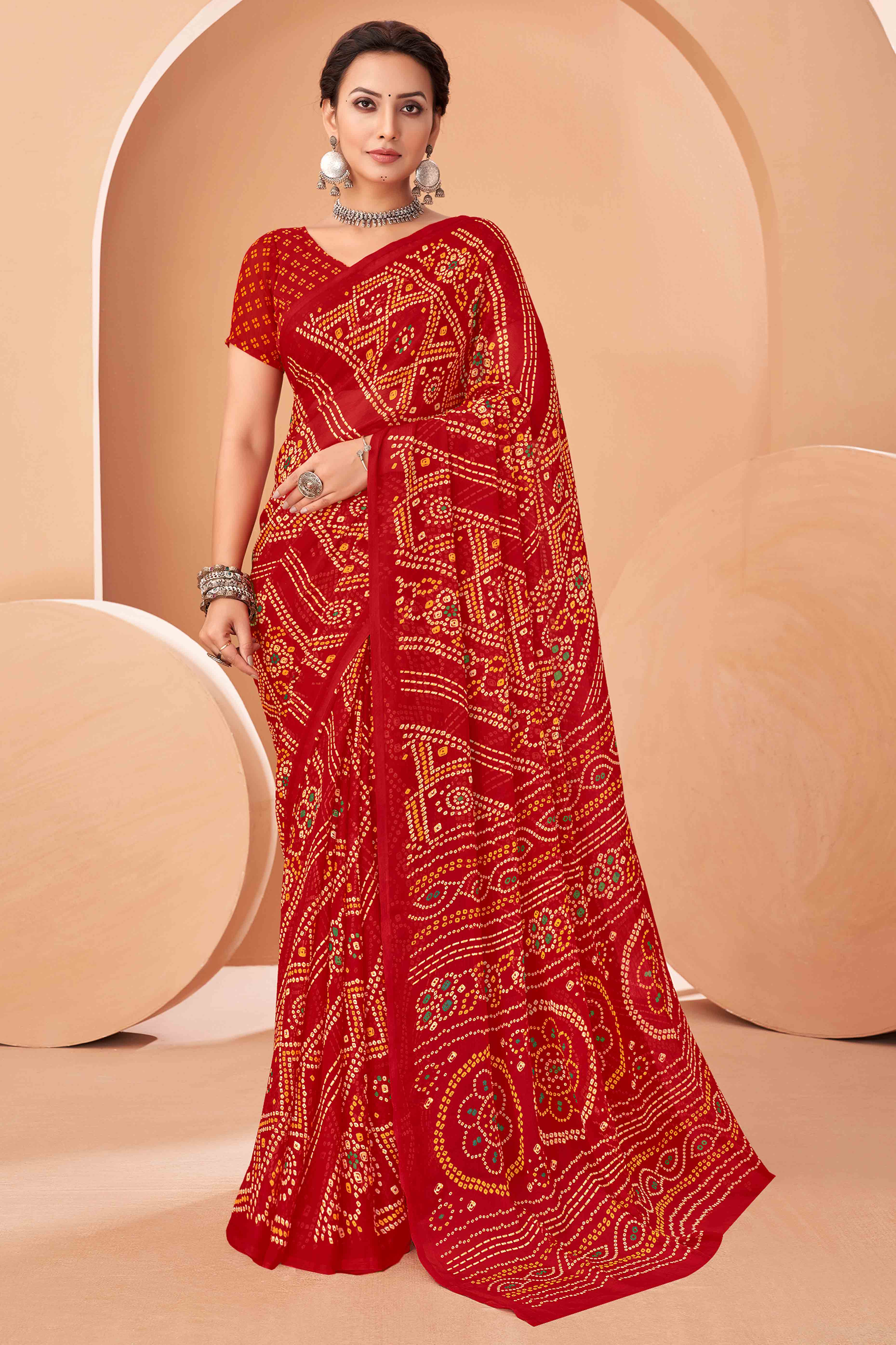 Red Bandhani Printed Chiffon Saree Accented With Intricate Lace Border Work