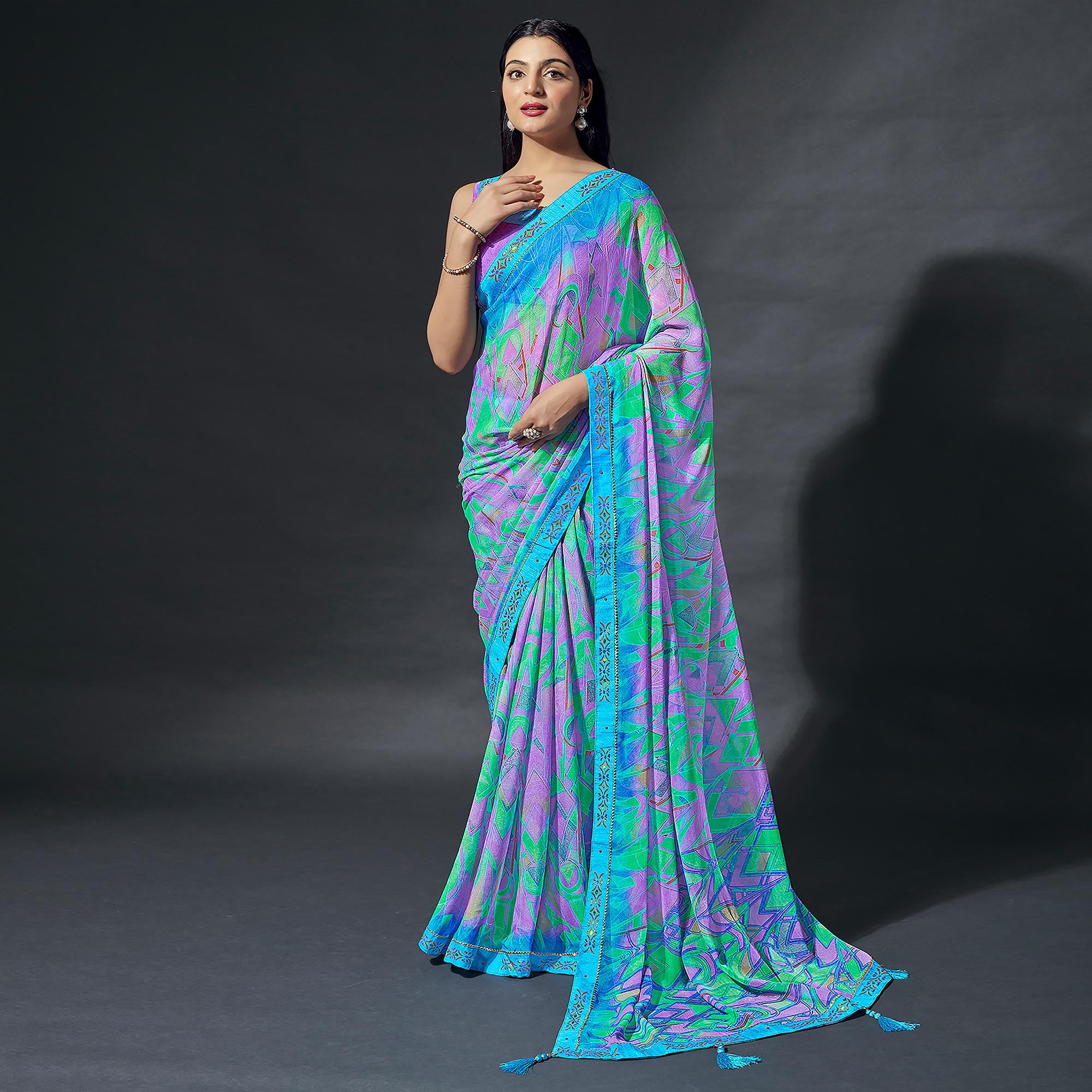 Turquoise Printed Chiffon Saree With Lace Border