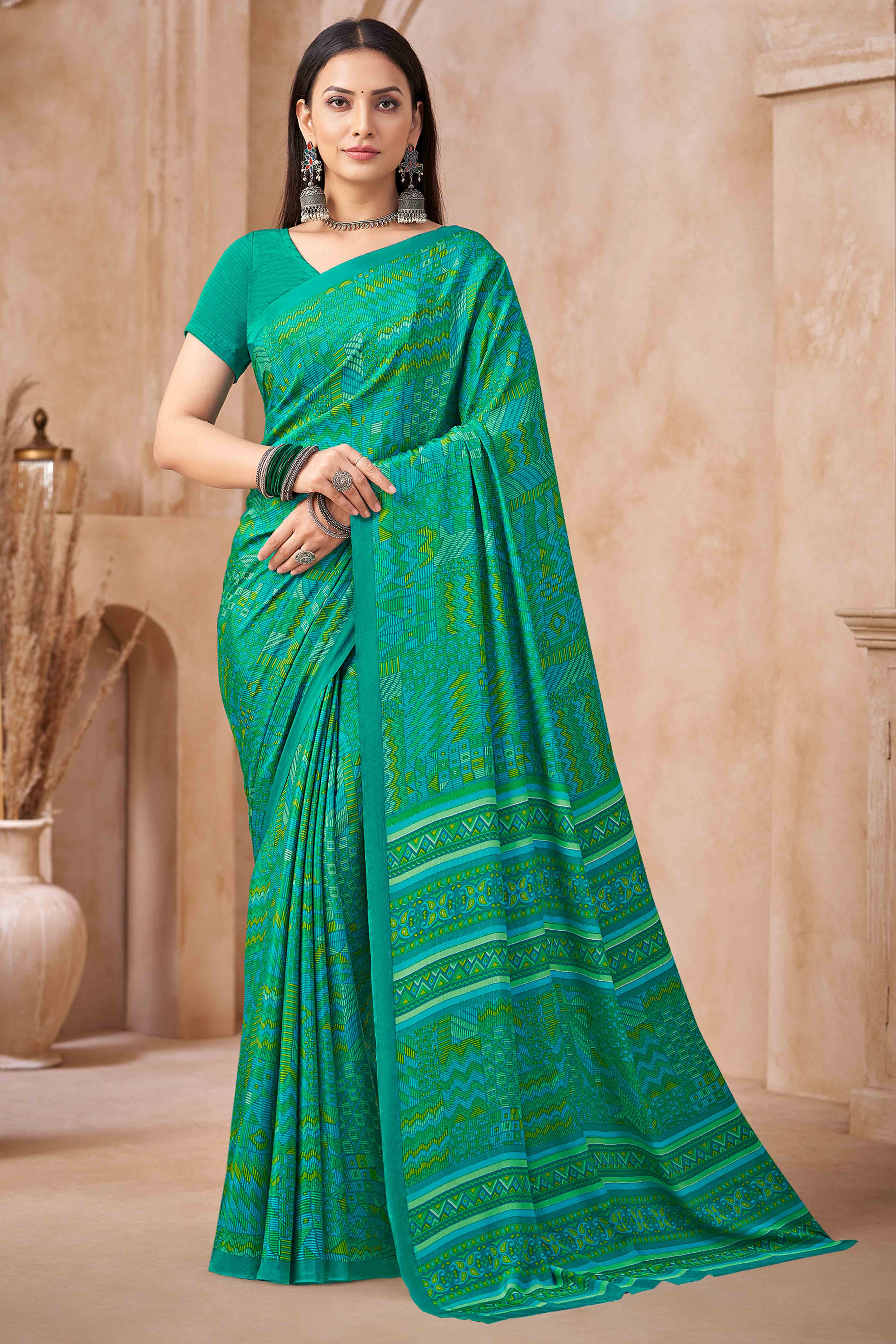 Rama Green Crepe Silk Saree Featuring Delicate Geometric Print Work
