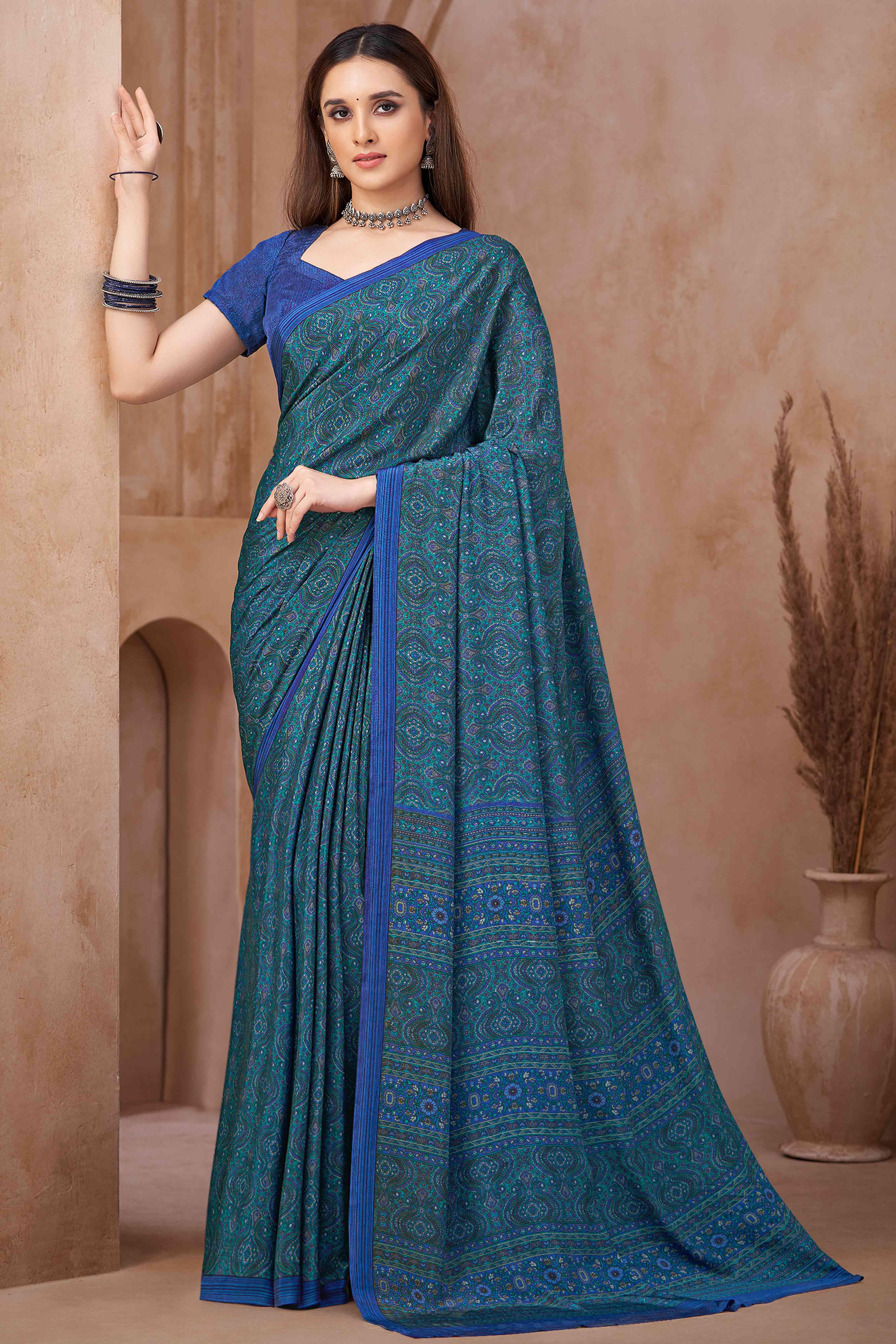 Blue Crepe Silk Saree Featuring Delicate Floral Print Work