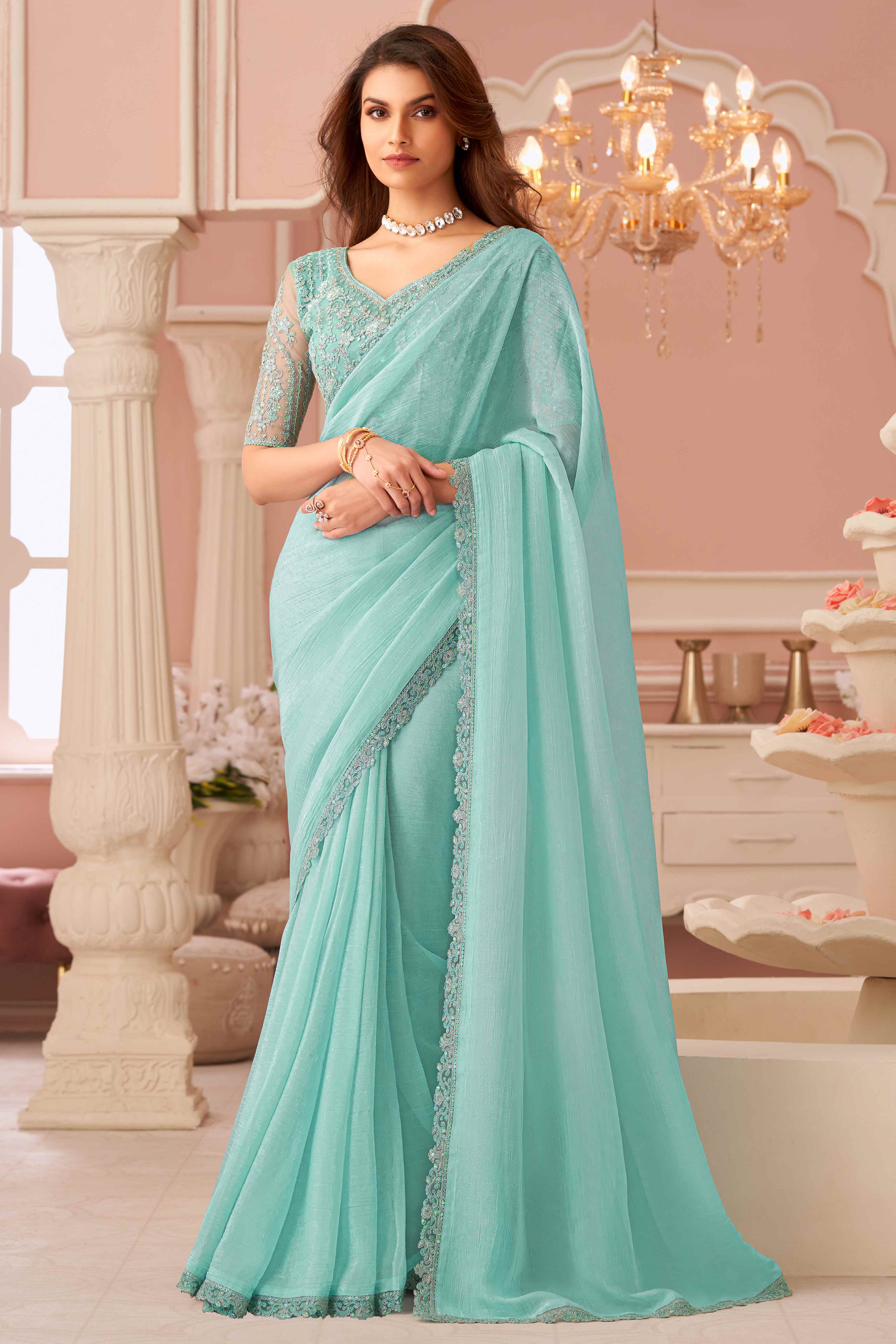 Turquoise Sequins Embroidered Georgette Saree