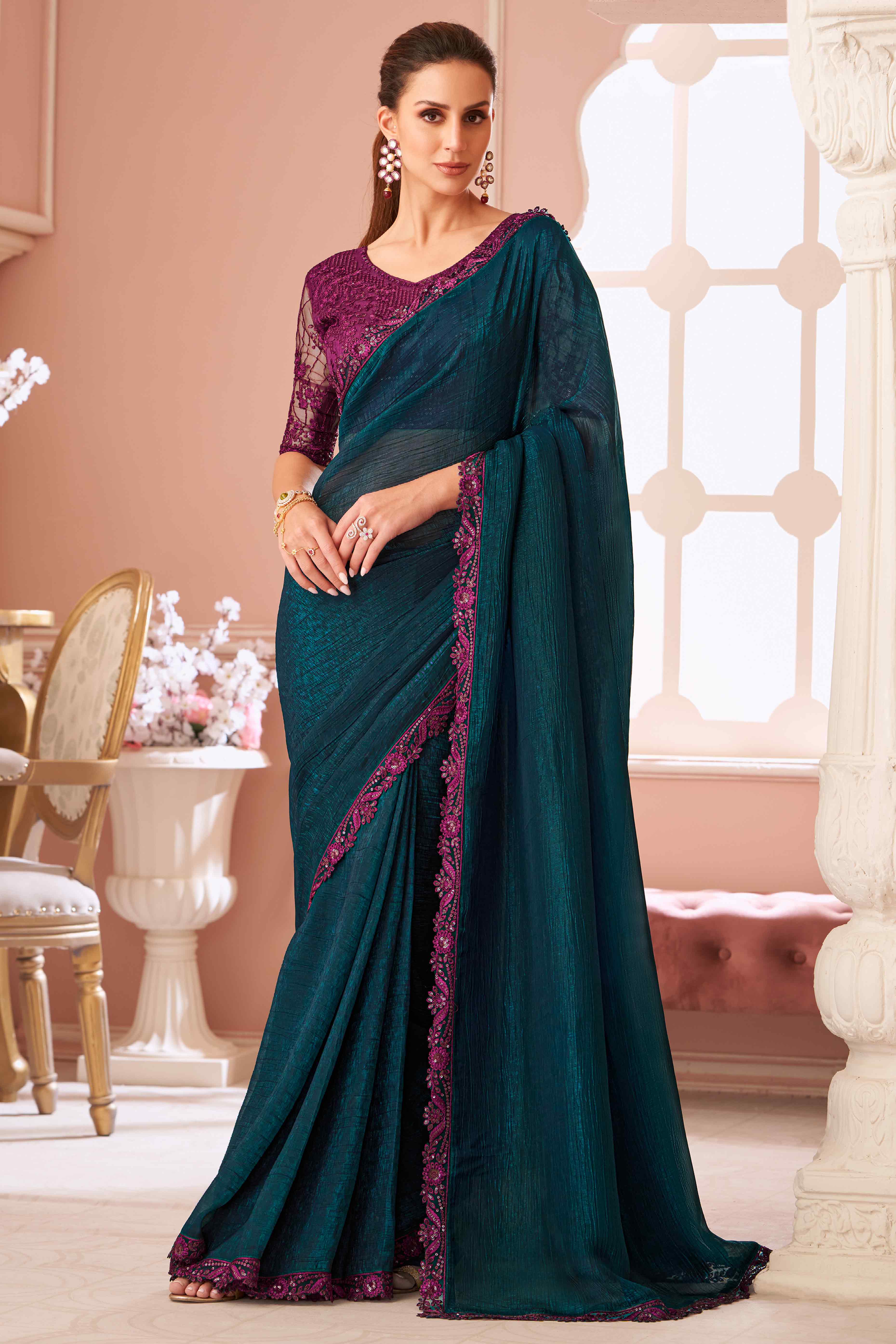 Teal Sequins Embroidered Georgette Saree