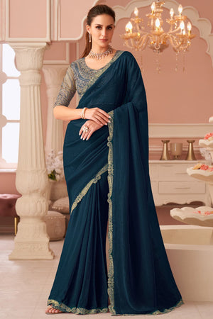 Graceful Teal Georgette Saree with Intricate Sequin Embroidery Detailing