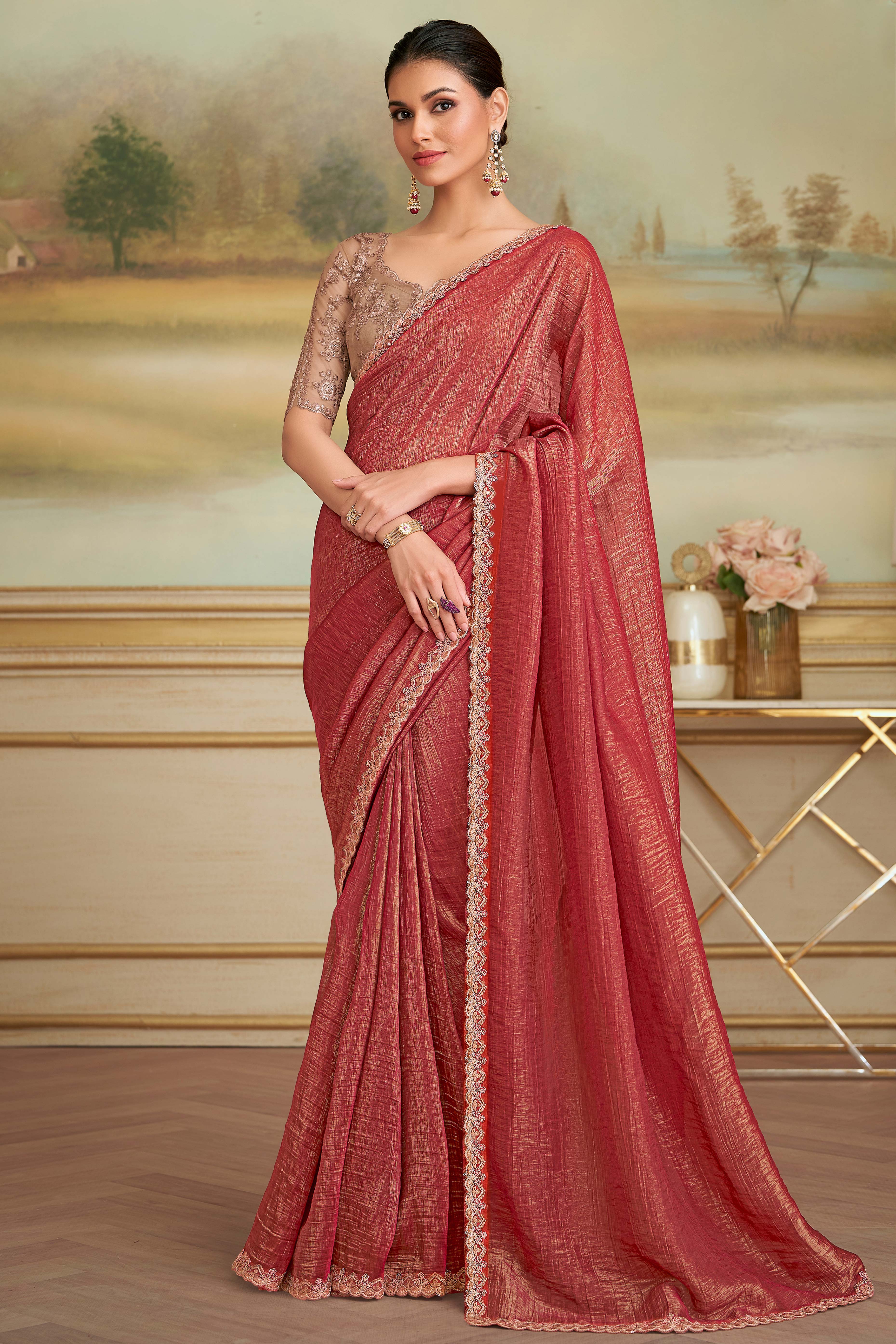 Graceful Brick Red Georgette Saree Adorned With Floral Sequins Embroidered Lace Border Work