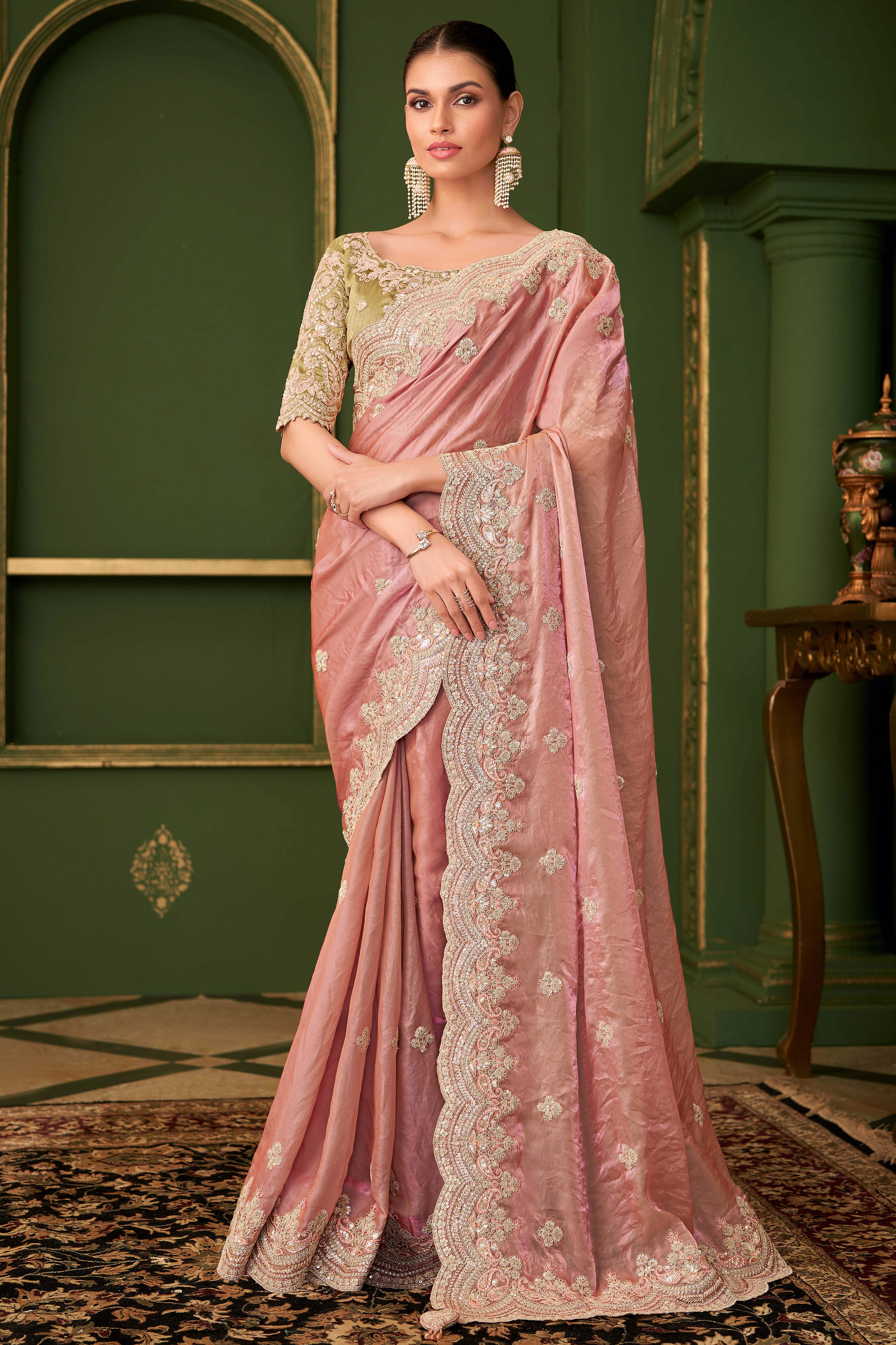 Graceful Peach Georgette Saree Adorned With Floral Cording Sequins Embroidery & Cutwork Border