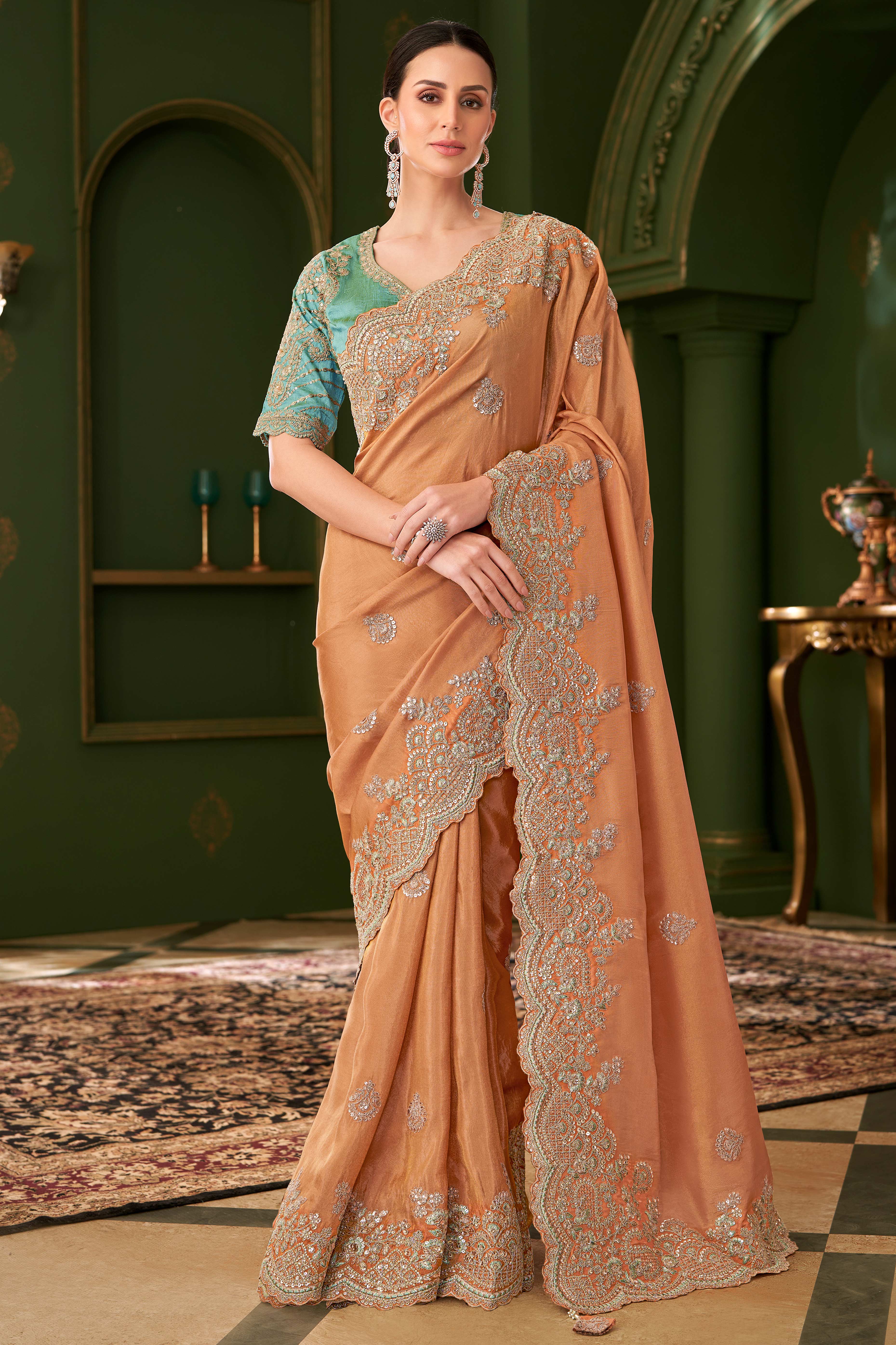 Premium Orange Georgette Saree Adorned With Floral Cording Sequins Embroidery & Cutwork Border