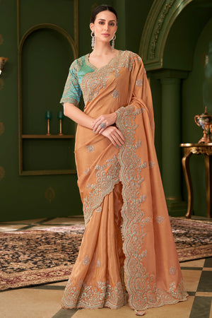 Premium Orange Georgette Saree Adorned With Floral Cording Sequins Embroidery & Cutwork Border