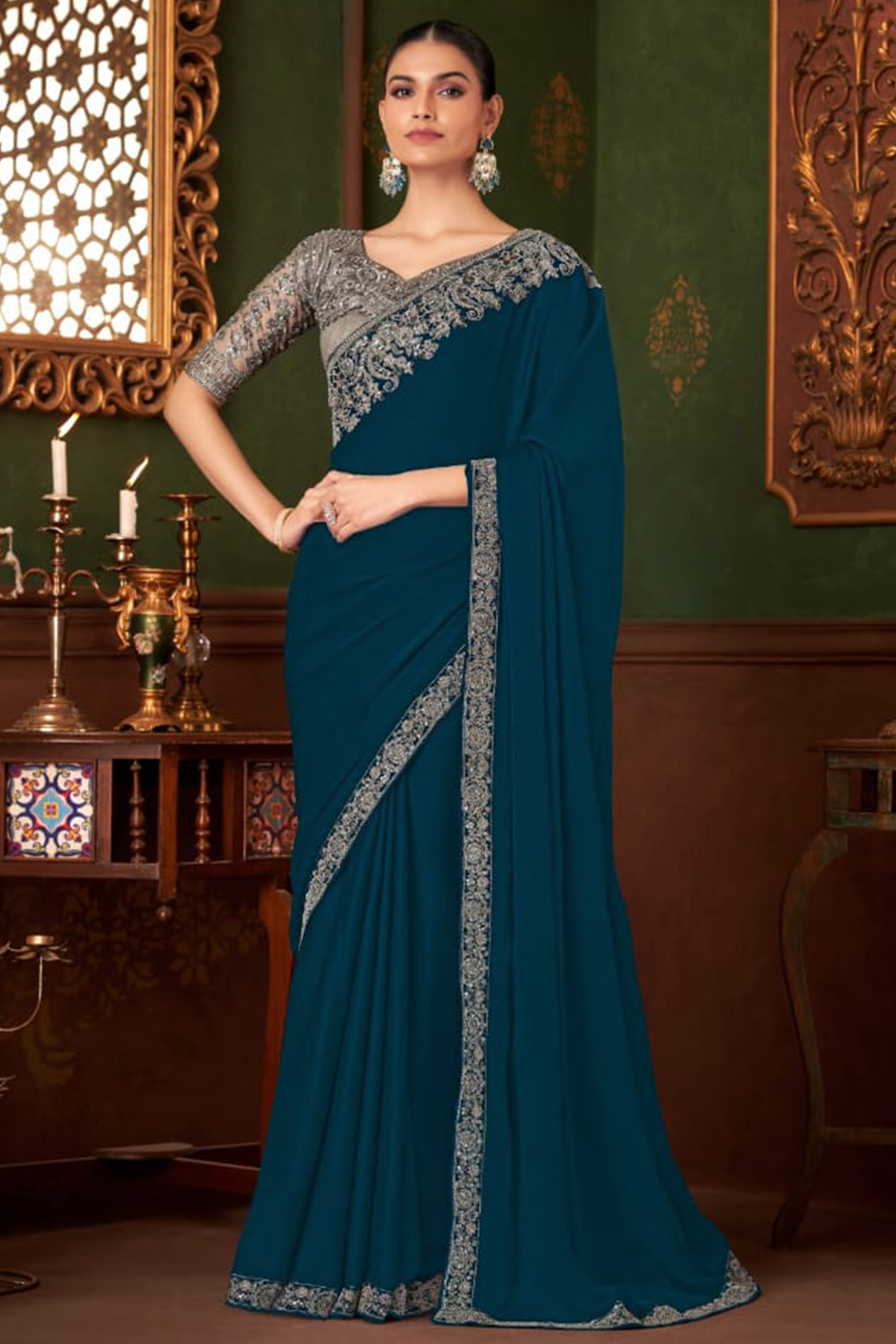 Graceful Blue Chiffon Saree Showcasing Exquisite Floral Thread Embroidery & Sequins Work