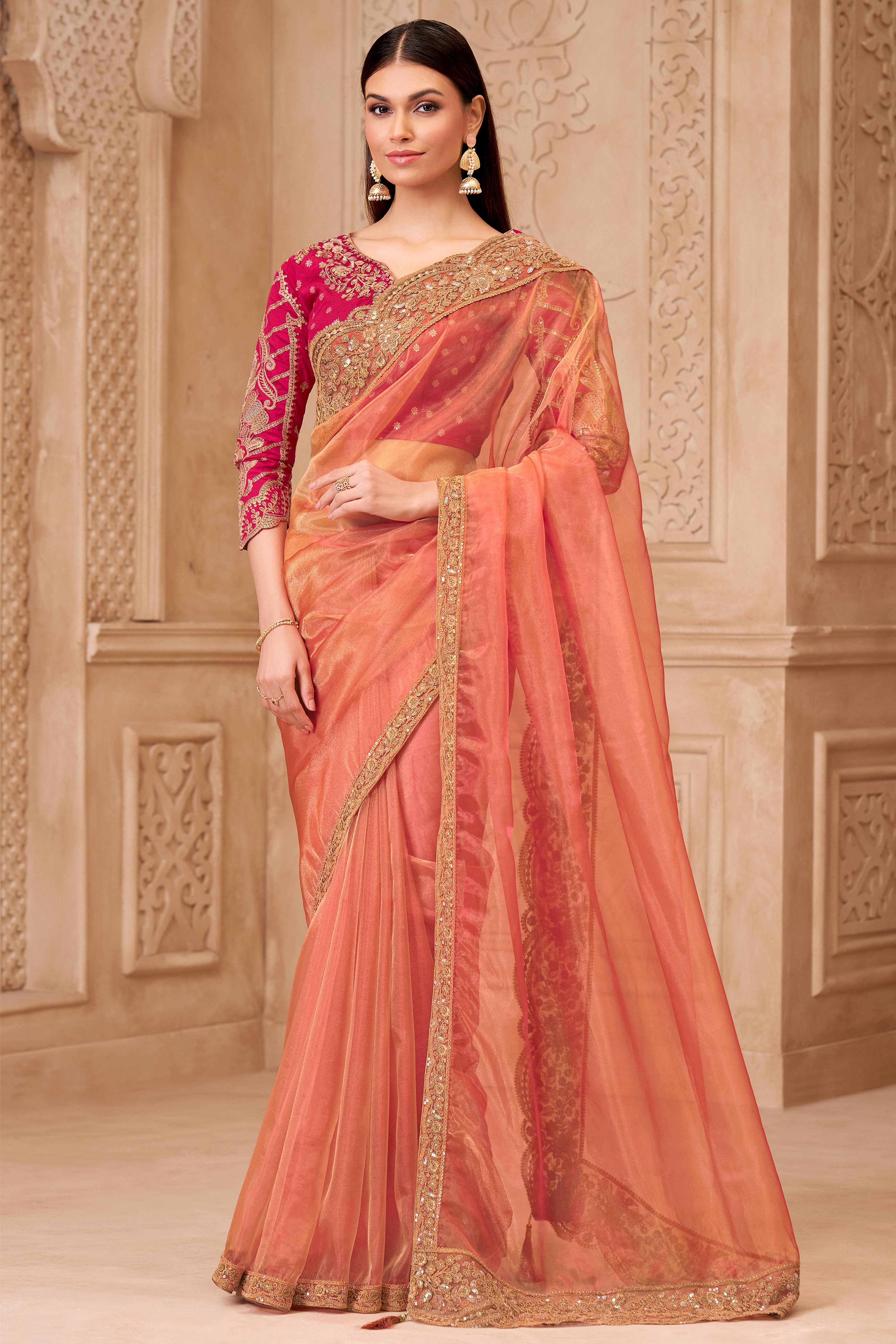 Shimmering Orange Georgette Saree with Graceful Thread Embellishment and Sequins
