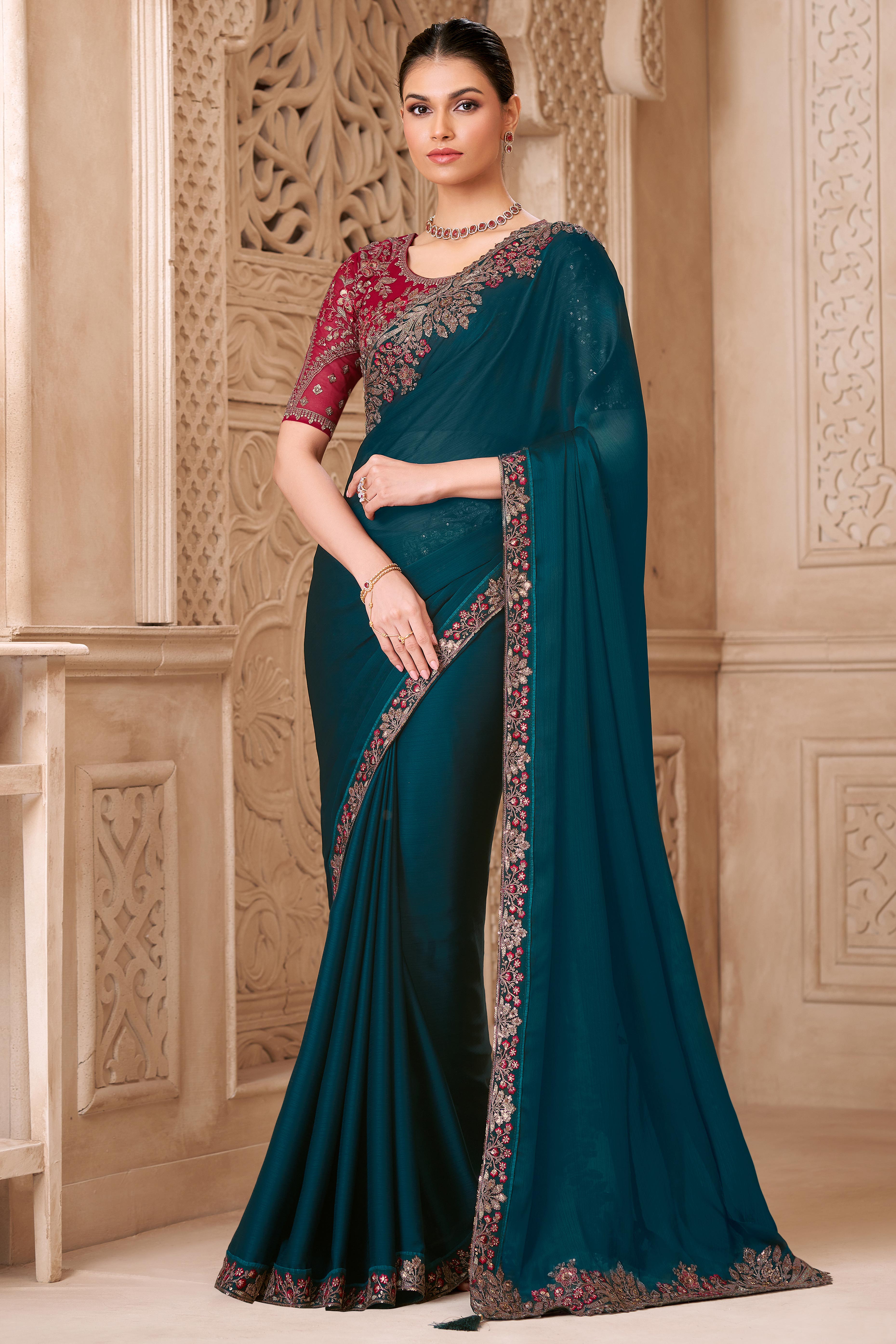 Shimmering Teal Georgette Saree with Graceful Thread Embellishment and Sequins