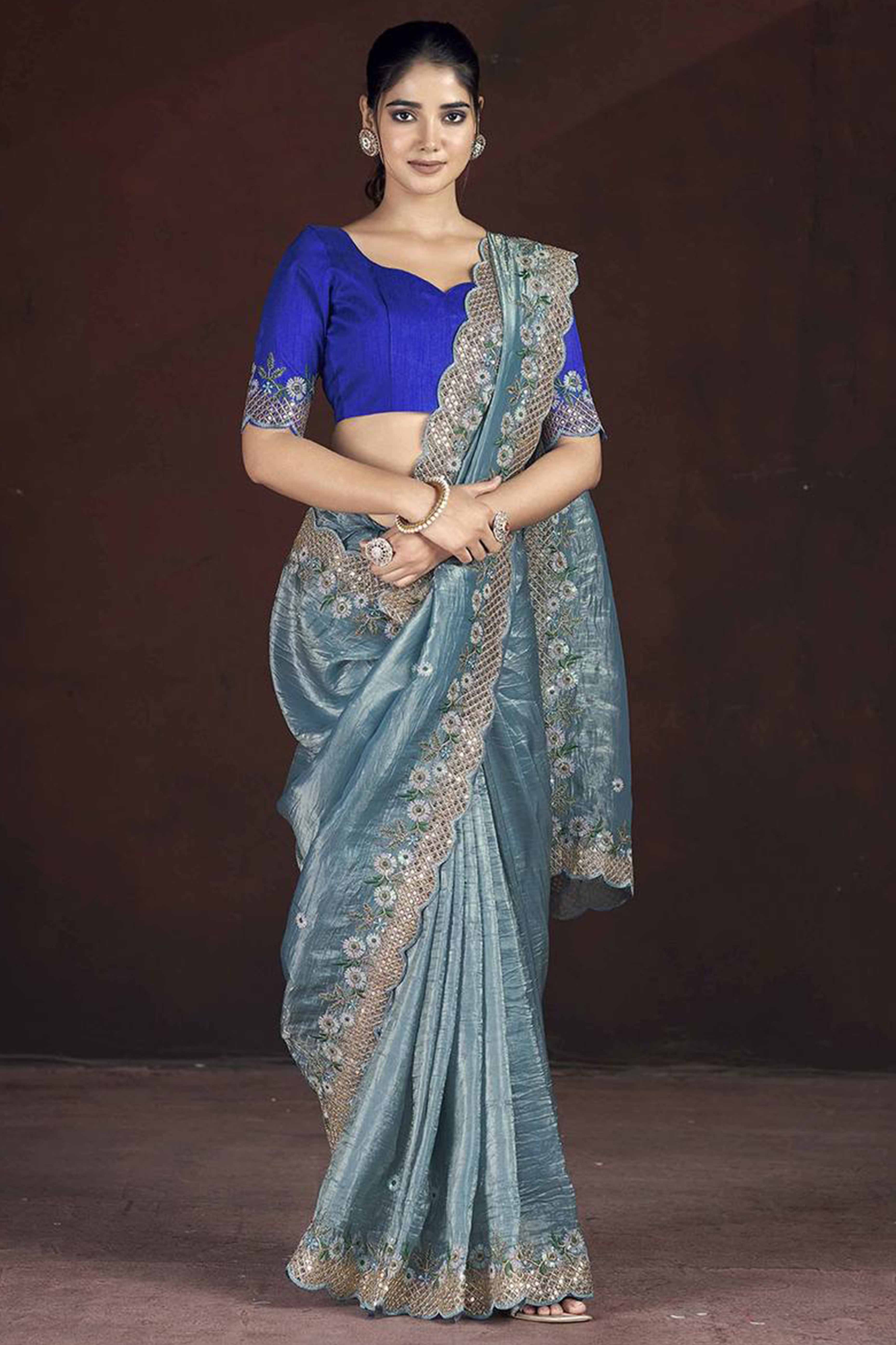 Blue Organza Saree with Embroidery on the Edges for a Graceful Contemporary Look