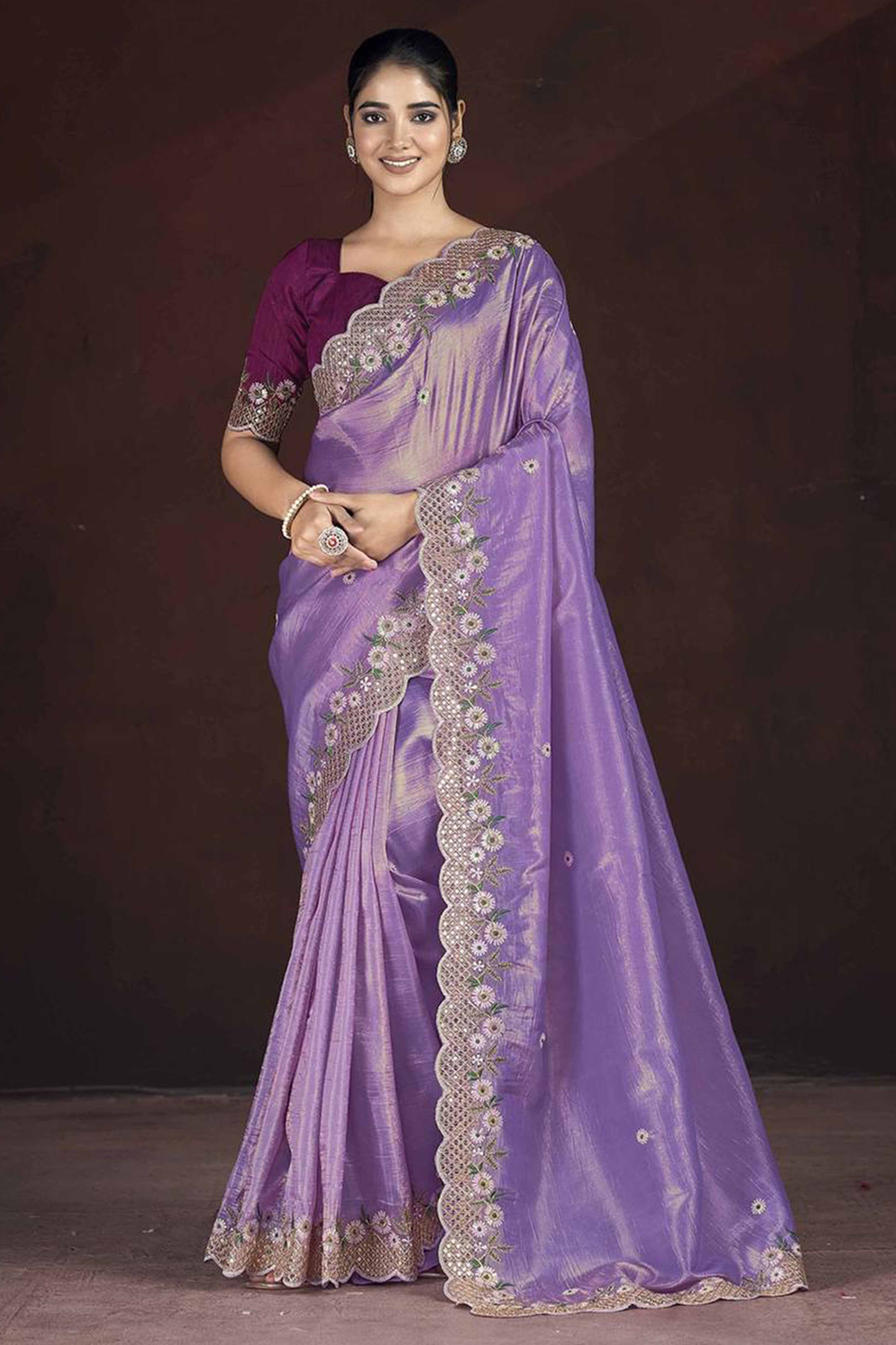 Lavender Organza Saree with Embroidery on the Edges for a Graceful Contemporary Look