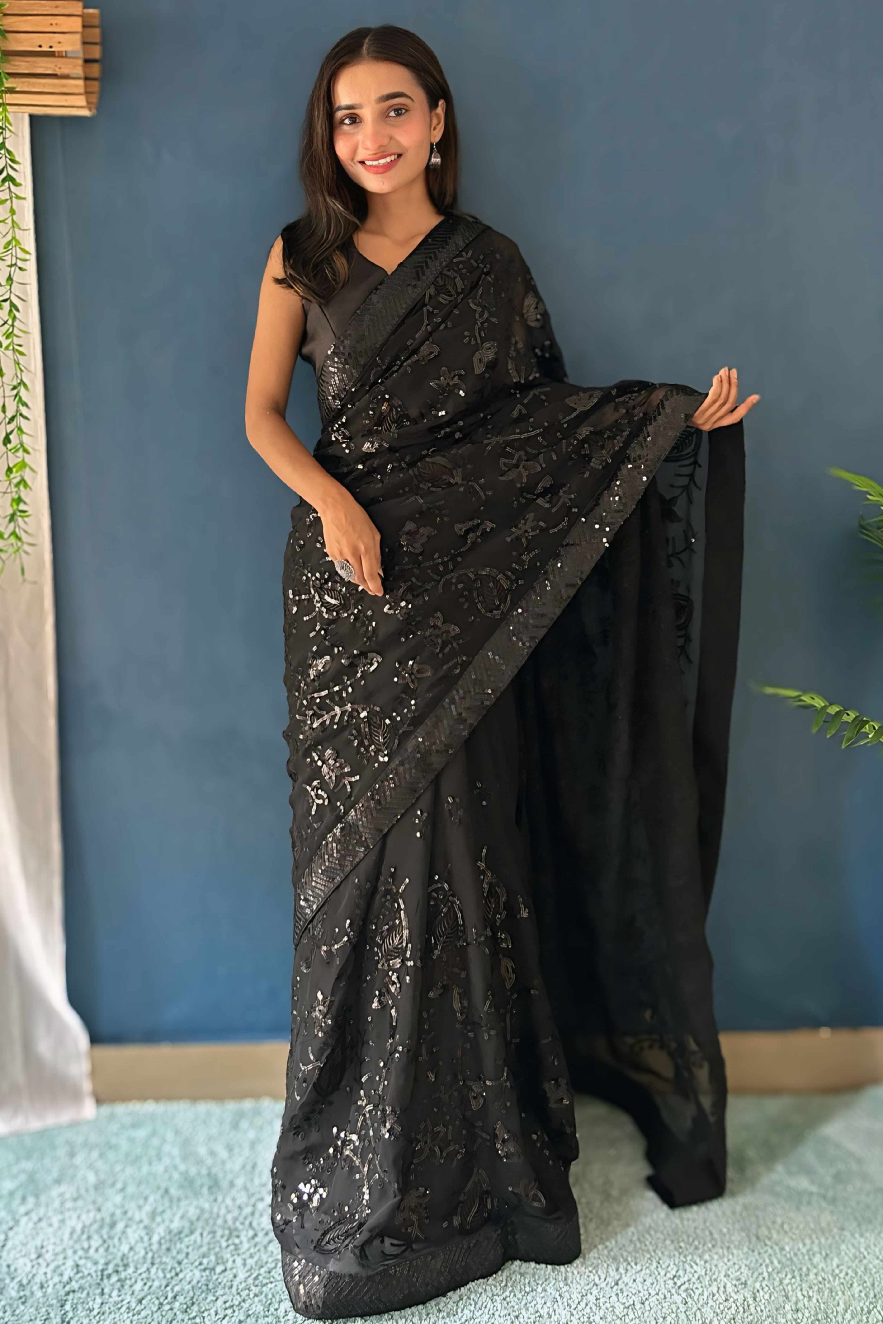 Black Sequins Embellished Georgette Saree with Delicate Embroidery and Sheer Grace