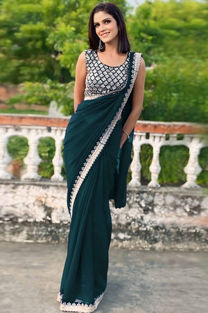 Morpich Green Georgette Saree With Sleek Solid Finish And Embroidered Edging