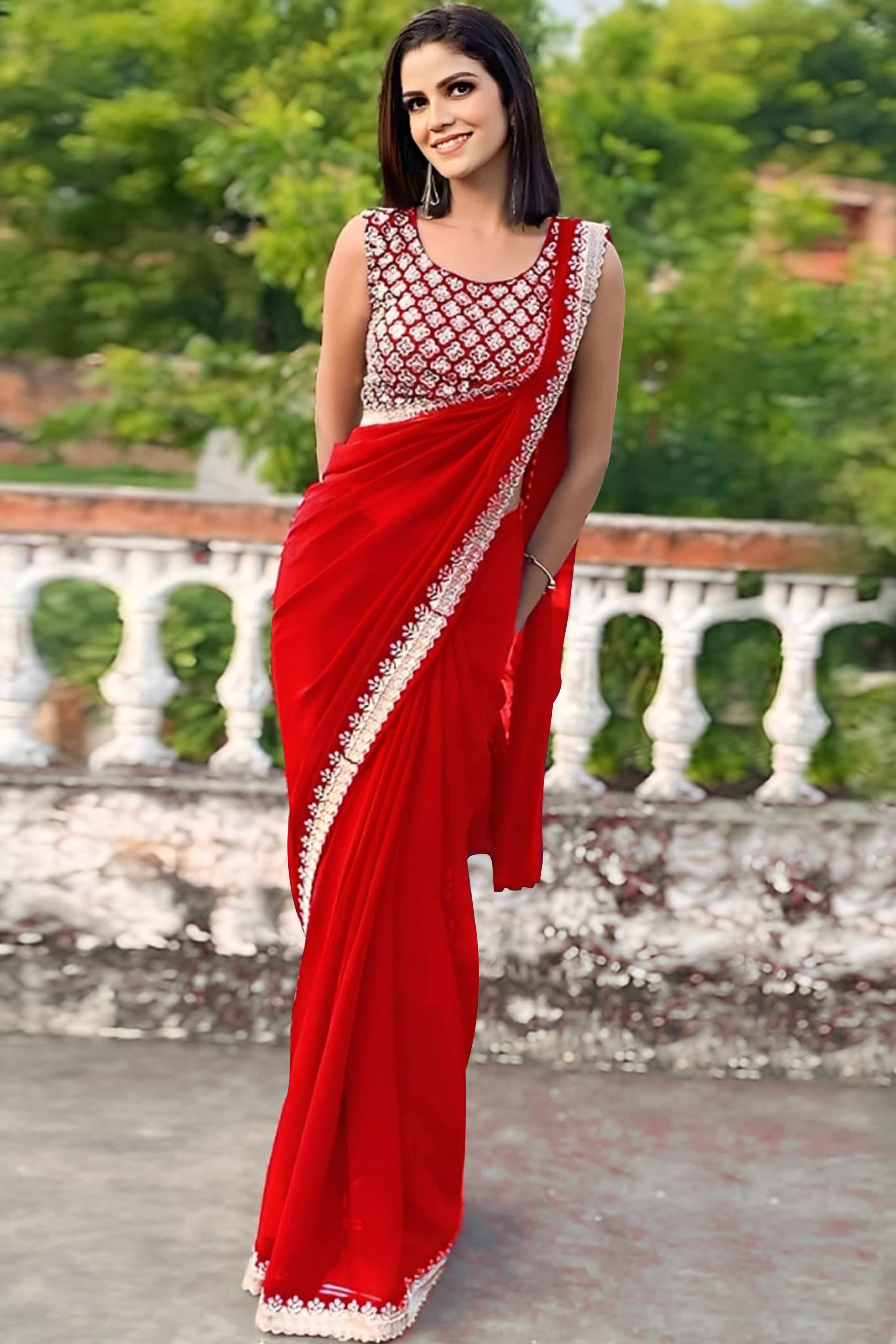 Red Georgette Saree With Sleek Solid Finish And Embroidered Edging