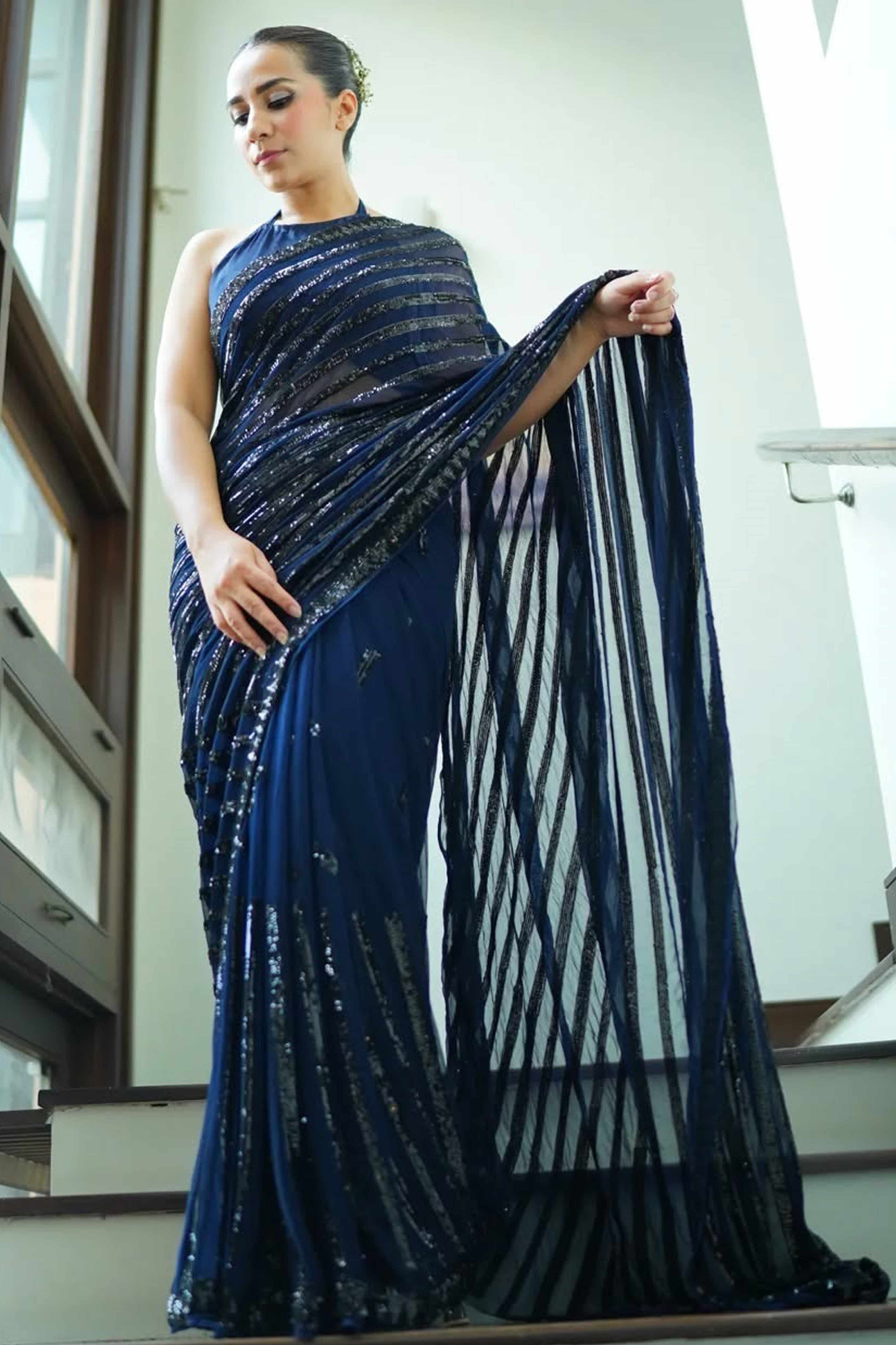 Blue Sequined Saree with Striped Design in Soft Georgette for Effortless Evening Elegance