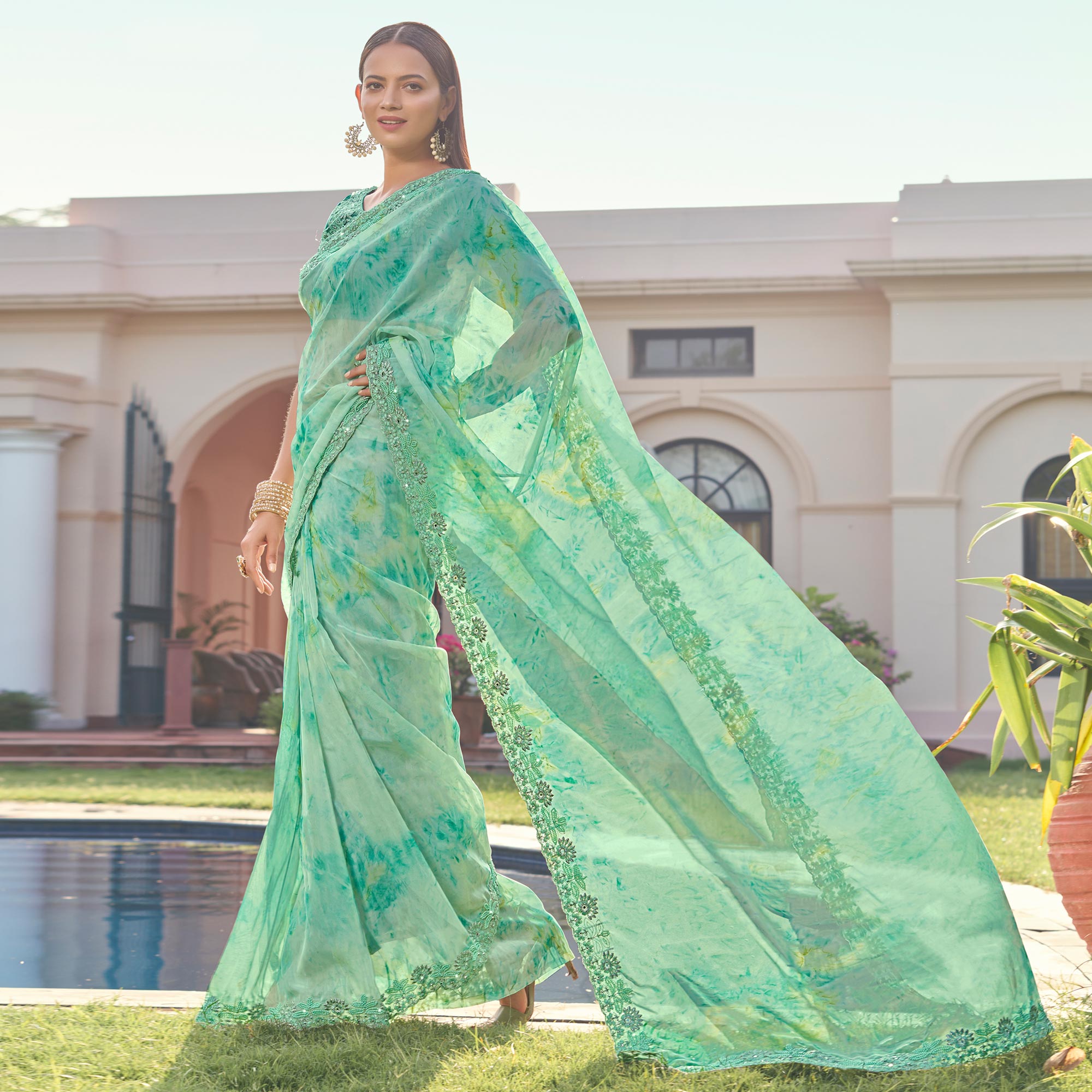 Turquoise Abstract Printed With Embroidered Organza Saree