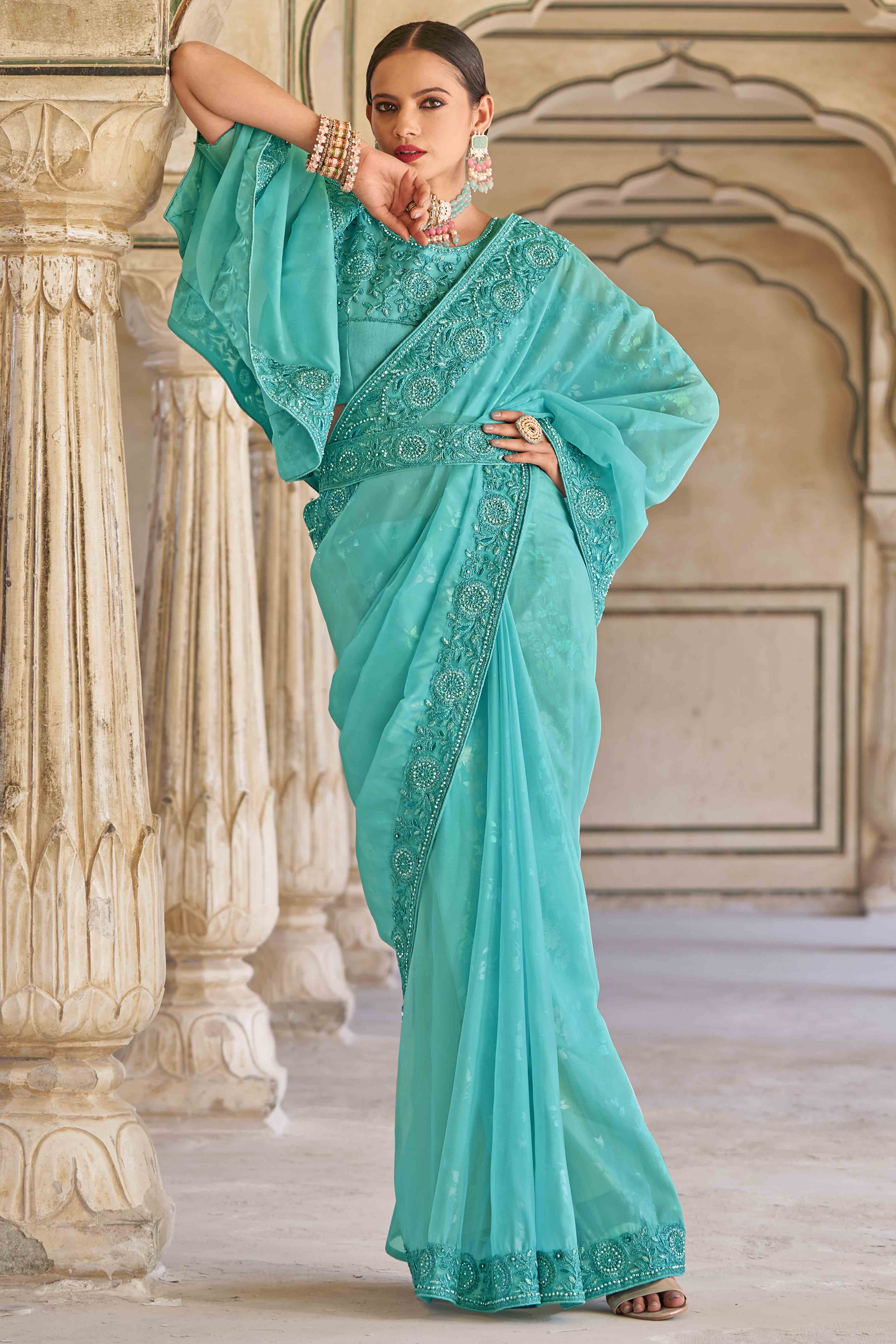 Turquoise Sequins Embroidered Georgette Saree