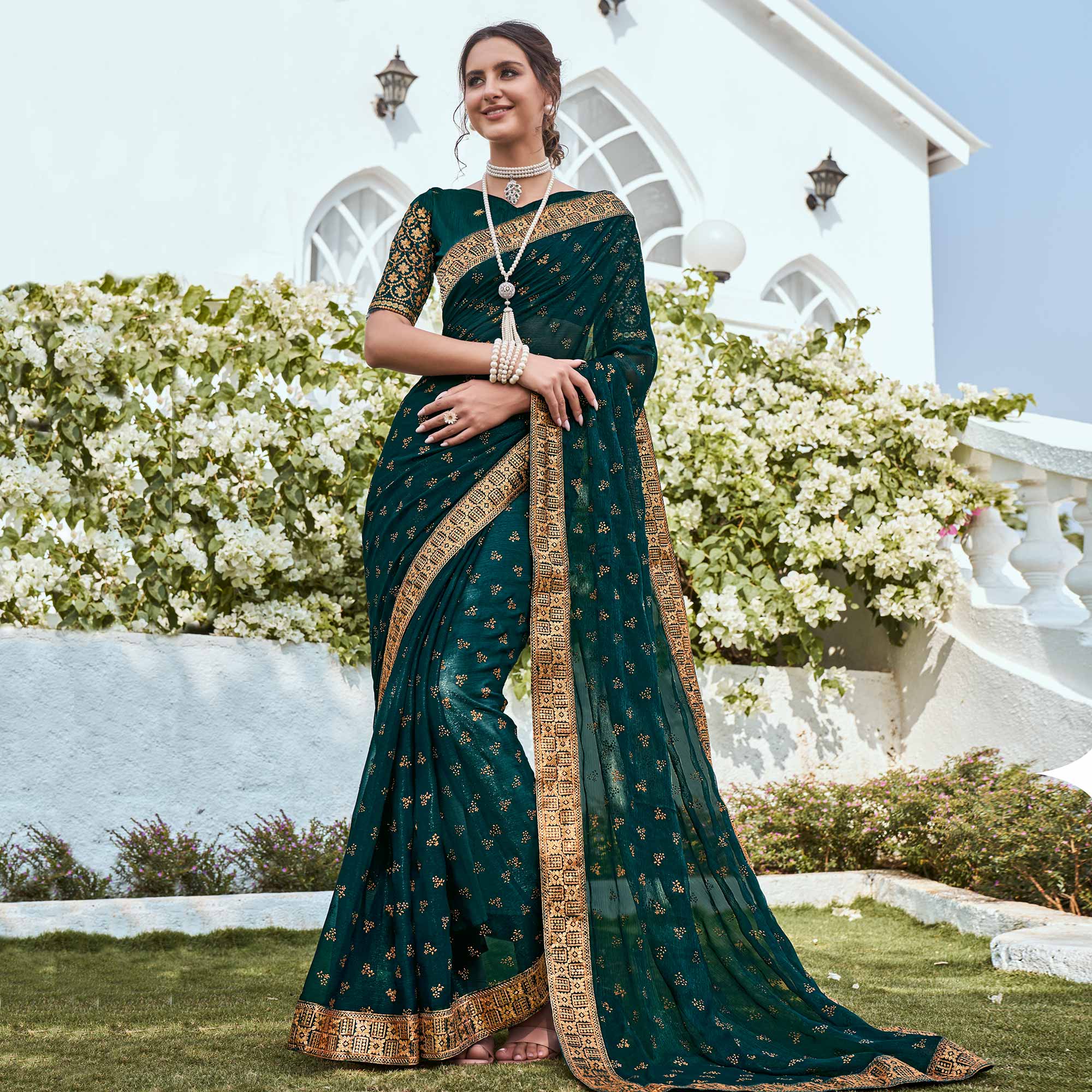 Dark Teal Green Foil Printed Georgette Saree With Embroidered Border