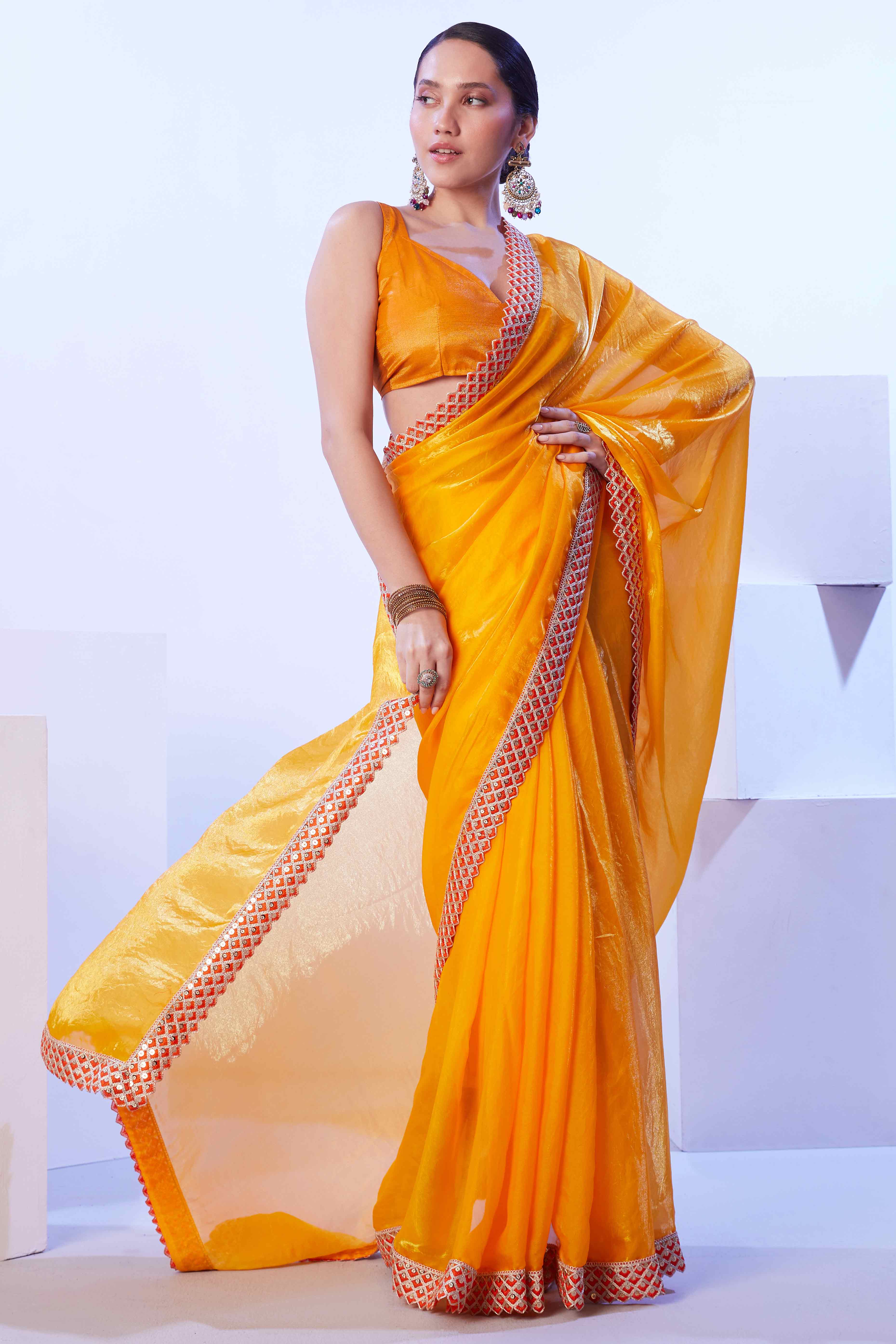 Bright Orange Satin Solid Embroidered Saree Adorned with Beads & Stones