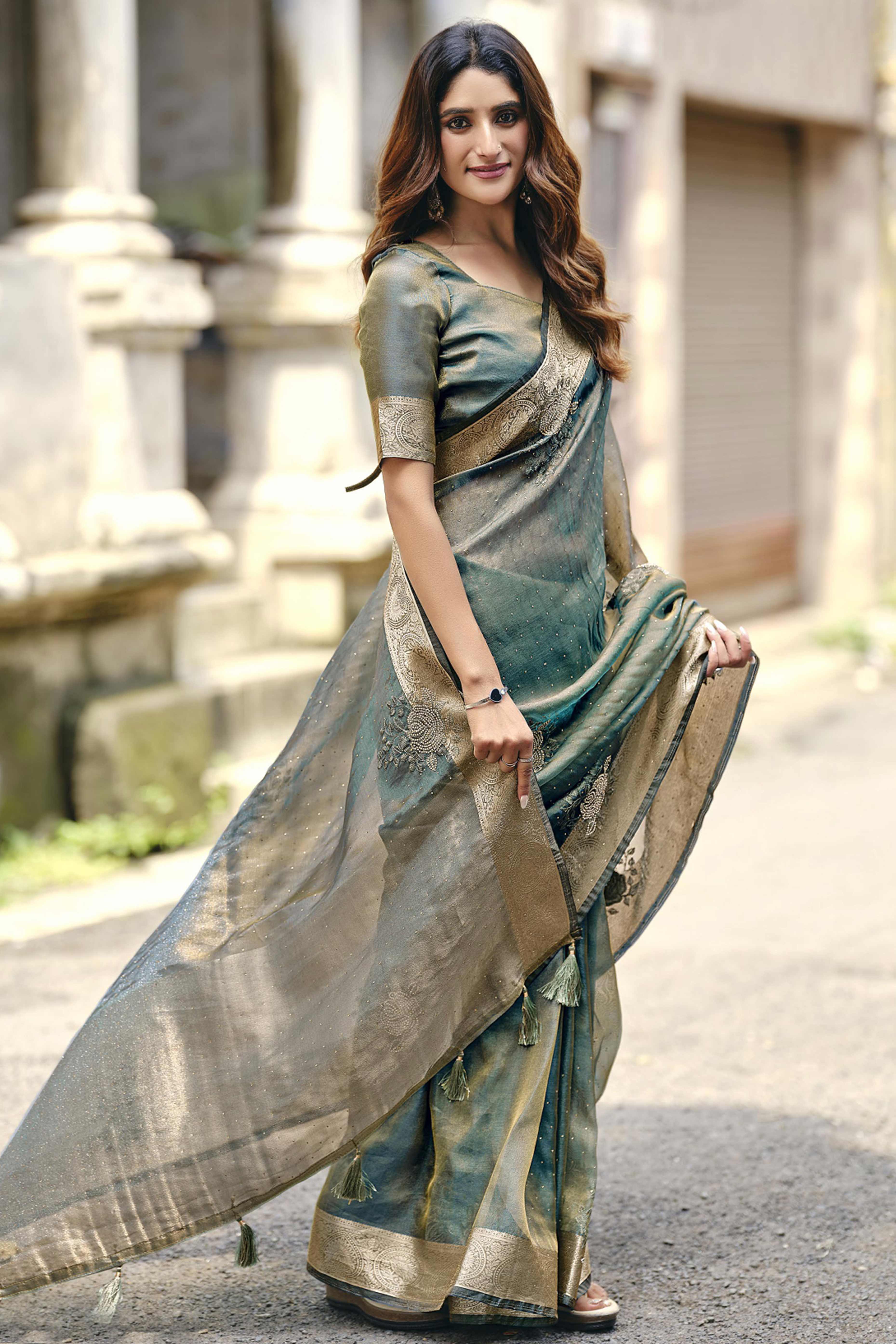 Emerald Green Nylon Saree Highlighted with Sparkling Stone Embroidery for Party & Festive Styling