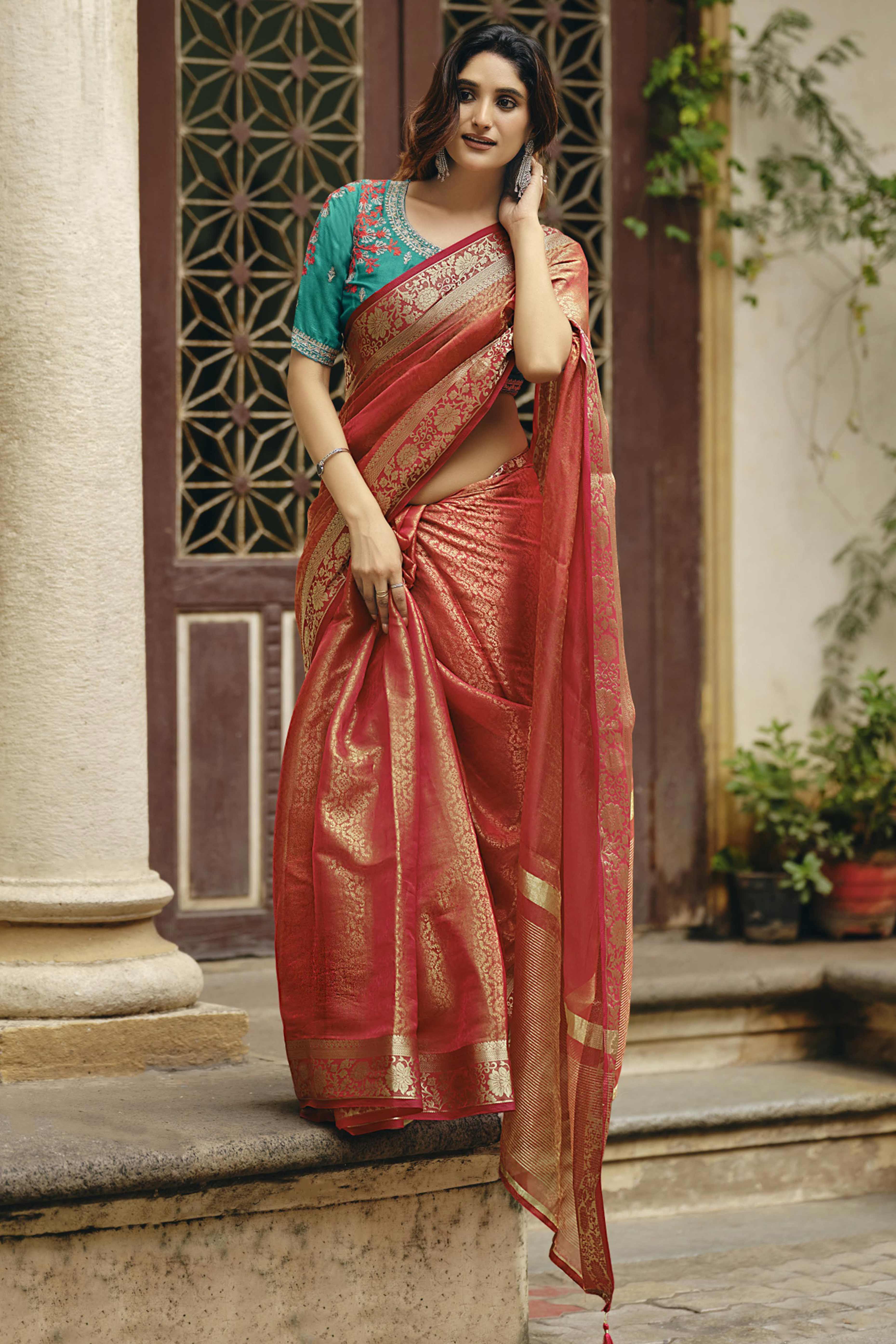 Elegant Orange Partywear Nylon Silk Saree with Stone & Weaving Details