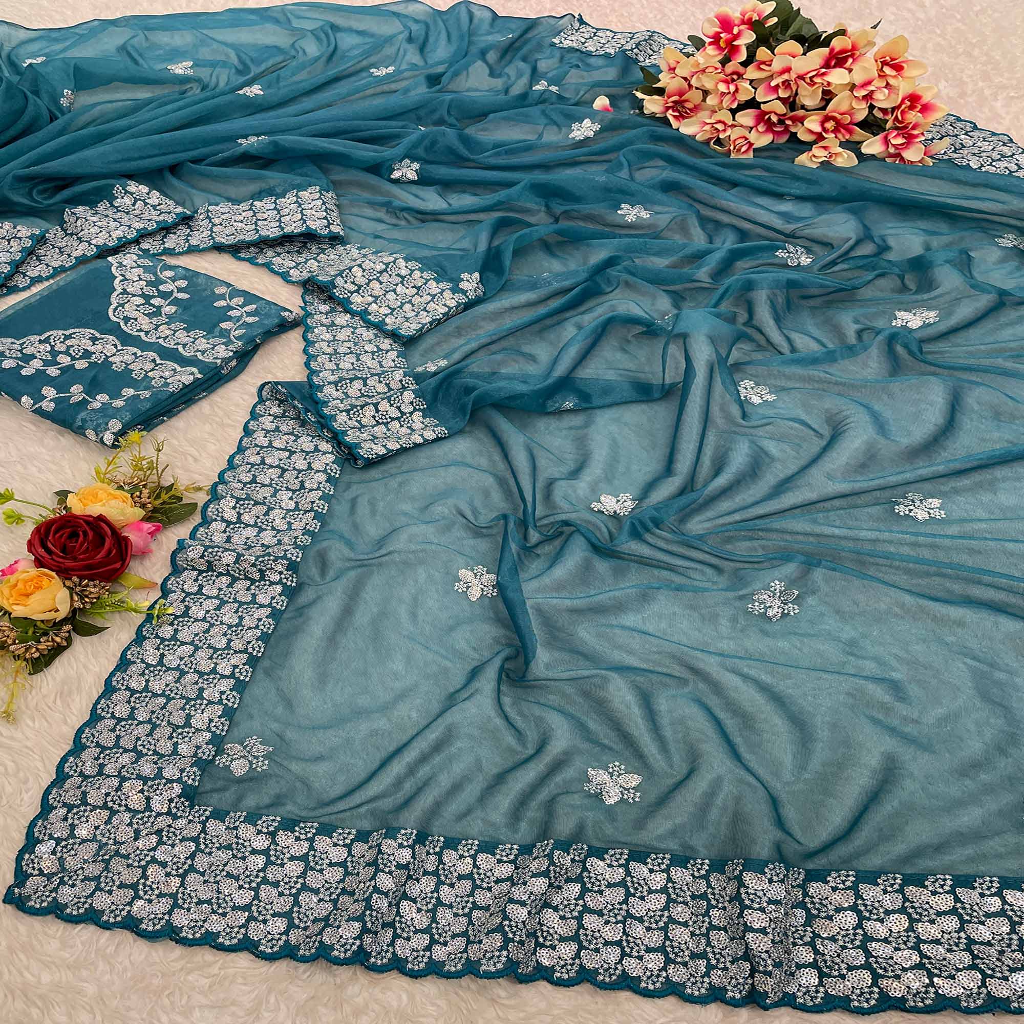 Teal Floral Embroidered Net Saree