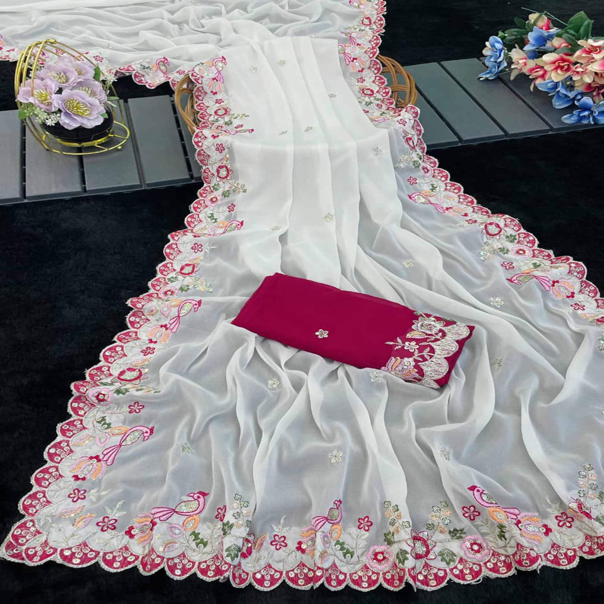 Stylish Off White Georgette Partywear Saree with Beautifully Embroidered Border Detailing