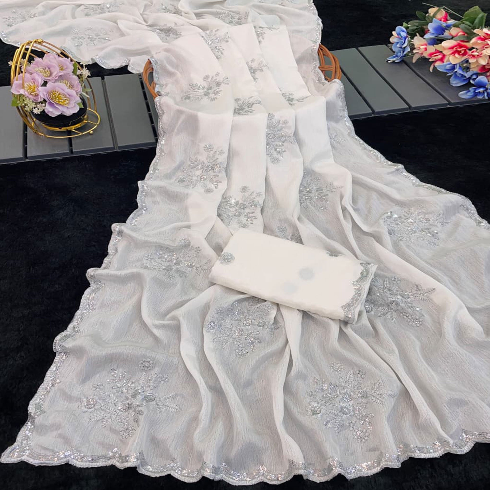 Designer Off White Pure Chinon Saree Highlighted with Elegant Sequins Embroidery