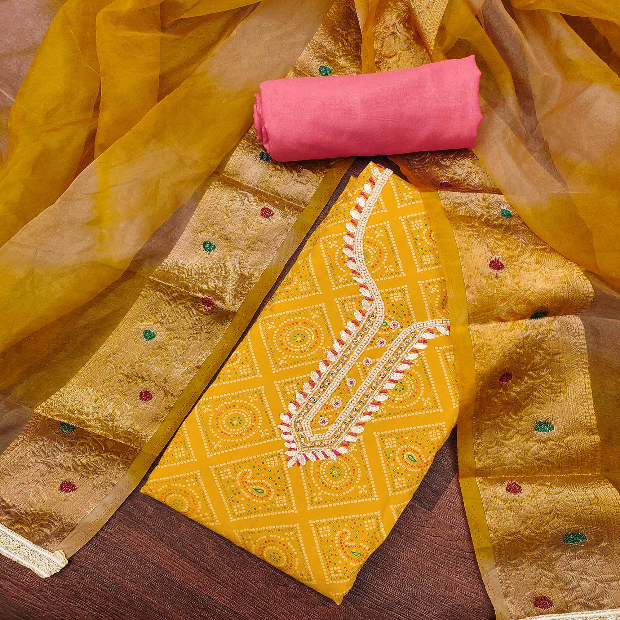 Yellow Bandhani Printed Cambric Cotton Dress Material With Intricate Moti & Gota Patti Handwork