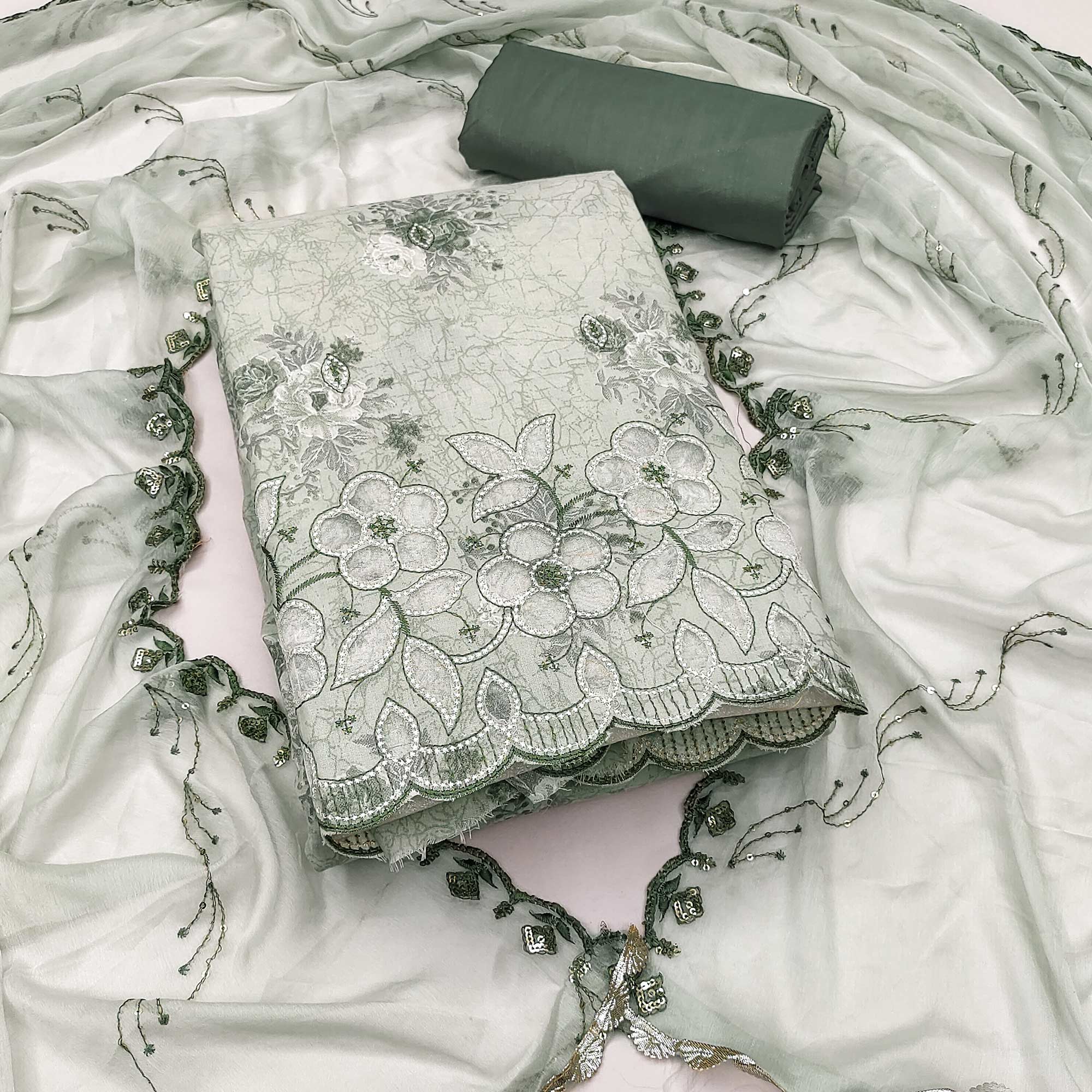 Green Floral Cambric Cotton Dress Material With Elegant Embroidery Work