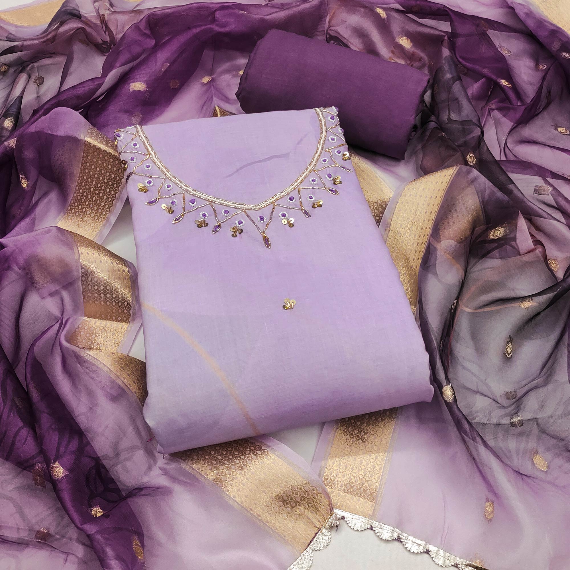 Lavender Cambric Cotton Dress Material Adorned With Floral Prints & Hand Moti Embellishment